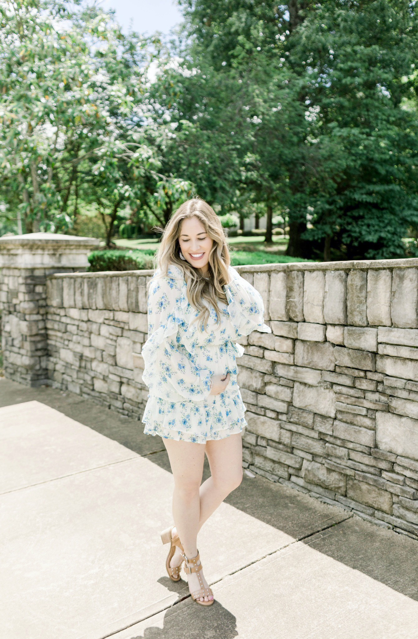Floral romper styled for summer by top Memphis fashion blogger, Walking in Memphis in High Heels: image of a woman wearing a Red Dress Boutique Floral Romper.