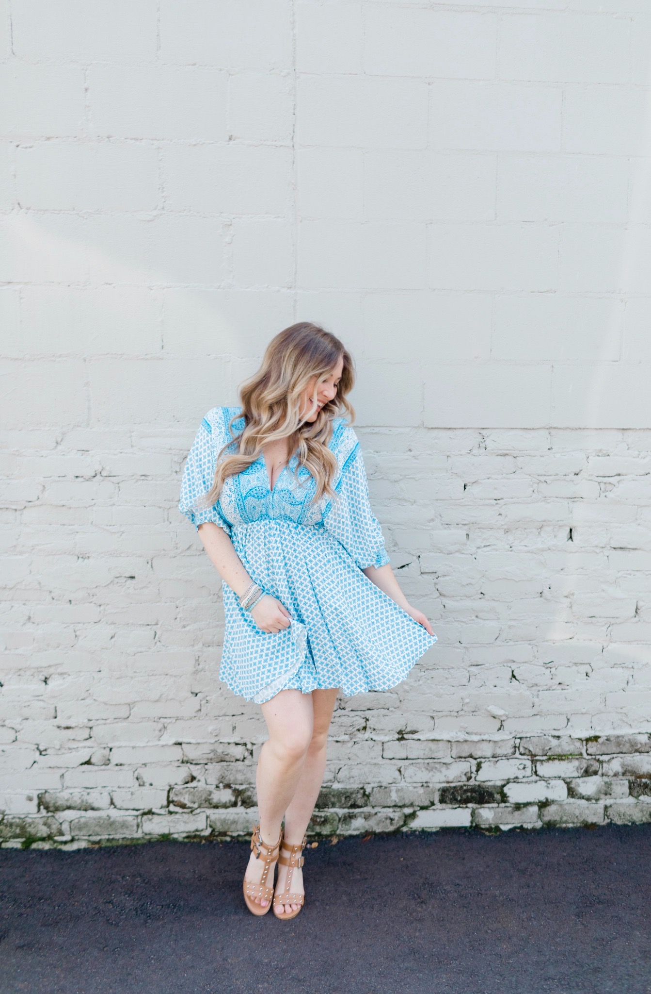 Summer accessories featured by top Memphis fashion blogger, Walking in Memphis in High Heels: image of a woman wearing Victoria Emerson bracelets.