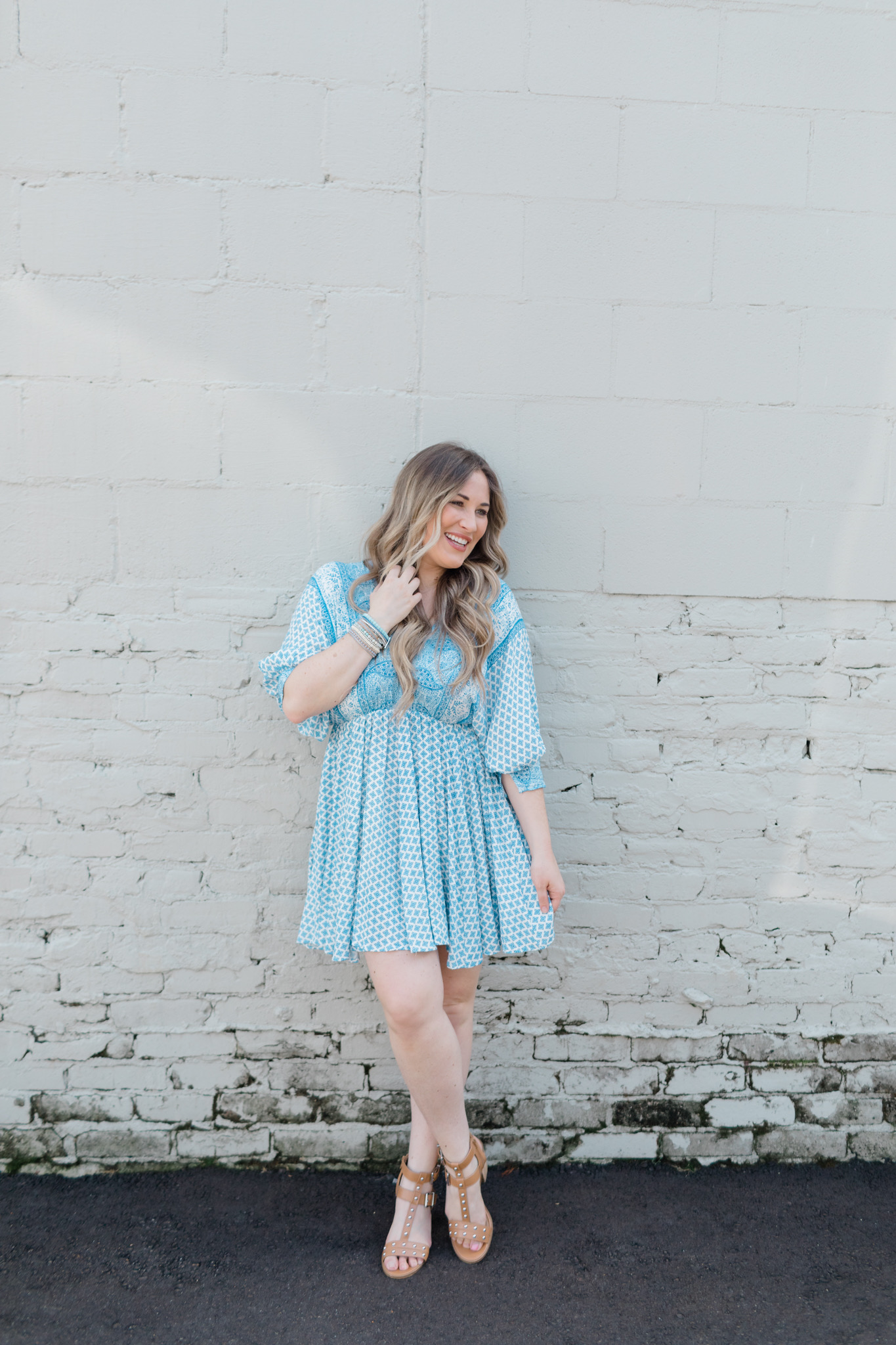 Summer accessories featured by top Memphis fashion blogger, Walking in Memphis in High Heels: image of a woman wearing Victoria Emerson bracelets.