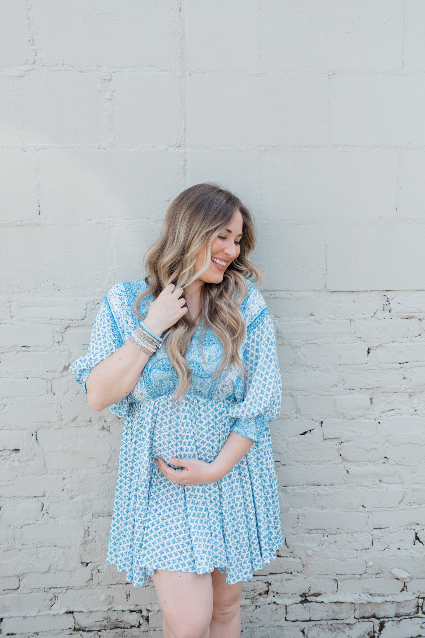 Summer accessories featured by top Memphis fashion blogger, Walking in Memphis in High Heels: image of a woman wearing Victoria Emerson bracelets.