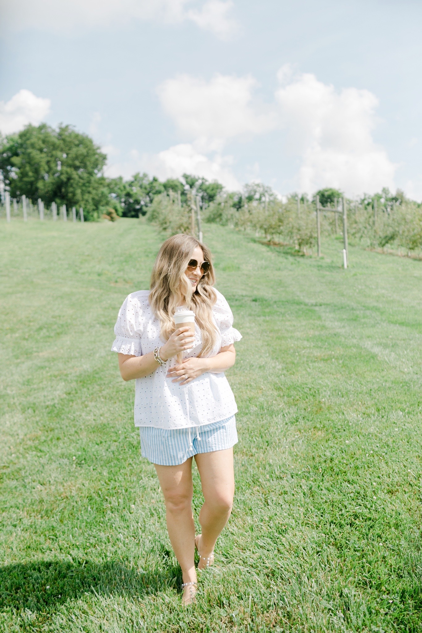 Cute summer shorts for women featured by top Memphis fashion blogger, Walking in Memphis in High Heels: image of a woman wearing Wild Fable High Rise shorts from Target.