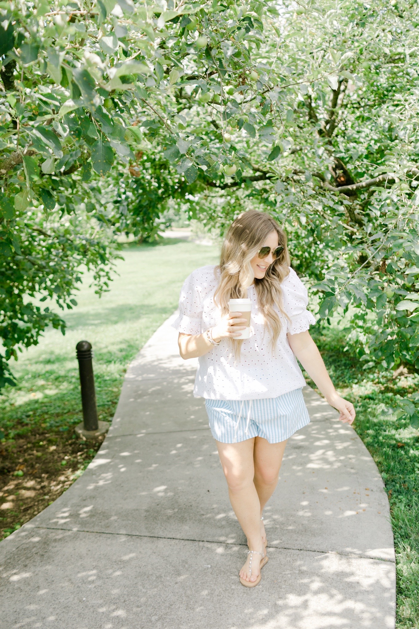 Cute summer shorts for women featured by top Memphis fashion blogger, Walking in Memphis in High Heels: image of a woman wearing Wild Fable High Rise shorts from Target.