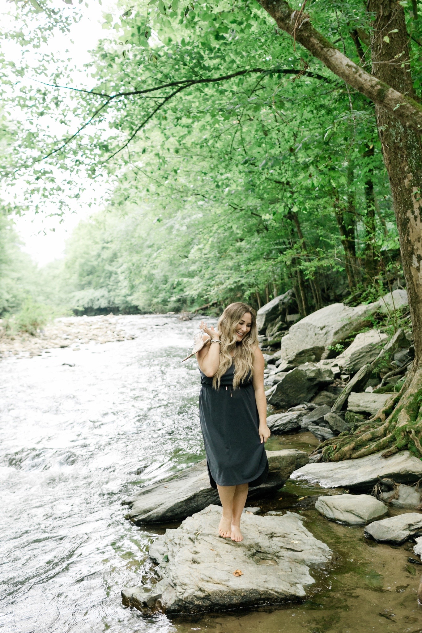 comfy casual summer outfits styled by top Memphis fashion blogger, Walking in Memphis in High Heels: image of a woman wearing an Old Navy sleeveless dress and Steve Madden clear sandals.