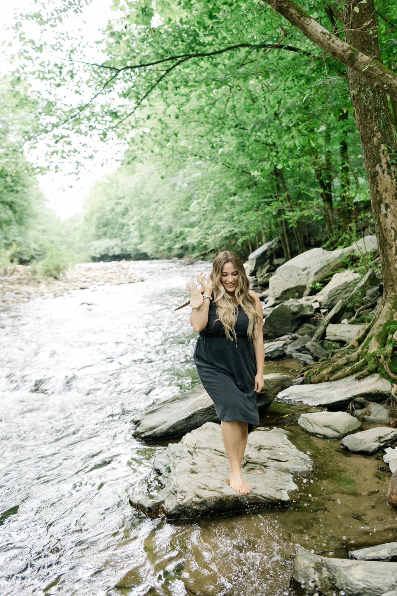 comfy casual summer outfits styled by top Memphis fashion blogger, Walking in Memphis in High Heels: image of a woman wearing an Old Navy sleeveless dress and Steve Madden clear sandals.