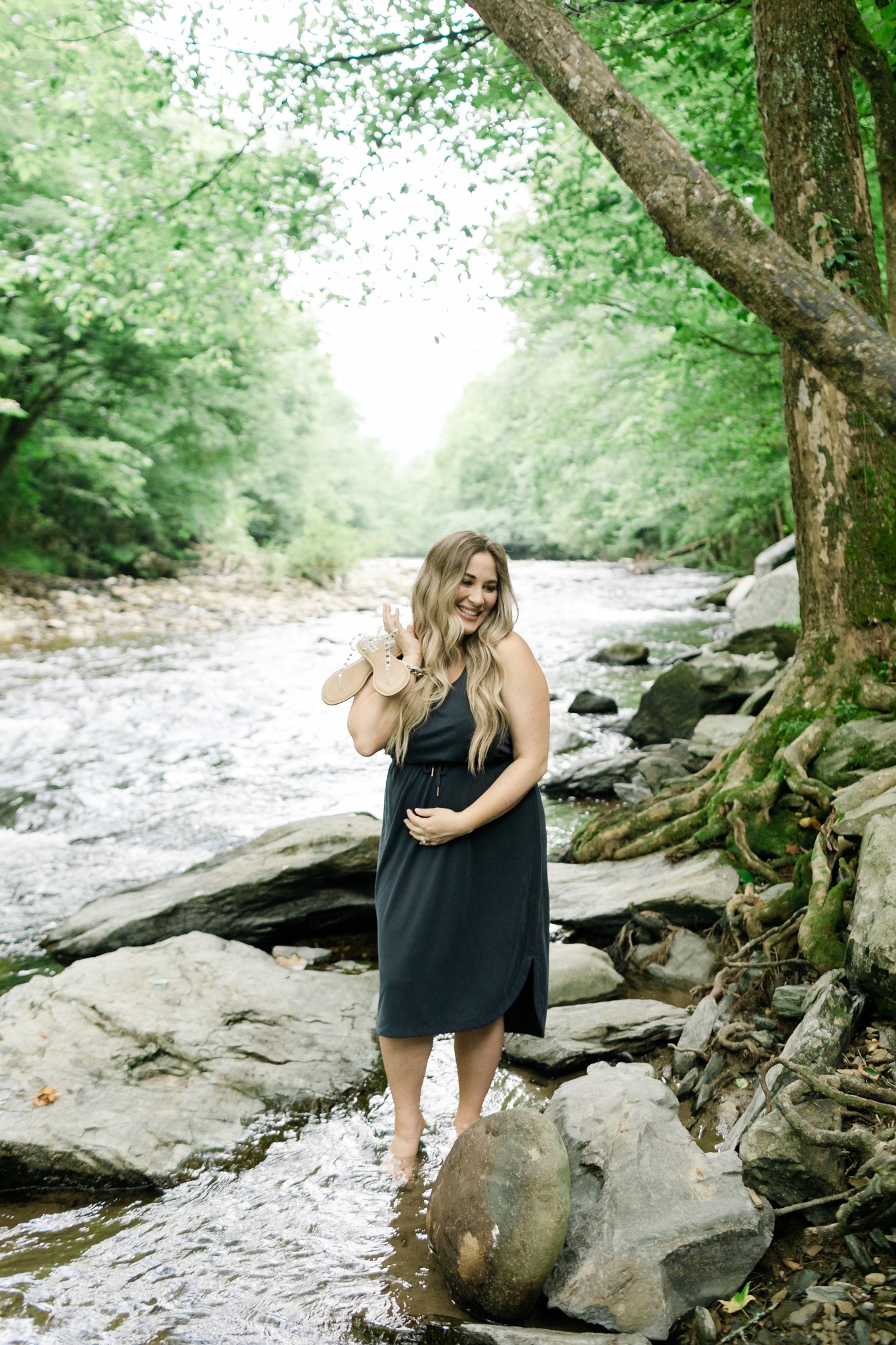 comfy casual summer outfits styled by top Memphis fashion blogger, Walking in Memphis in High Heels: image of a woman wearing an Old Navy sleeveless dress and Steve Madden clear sandals.