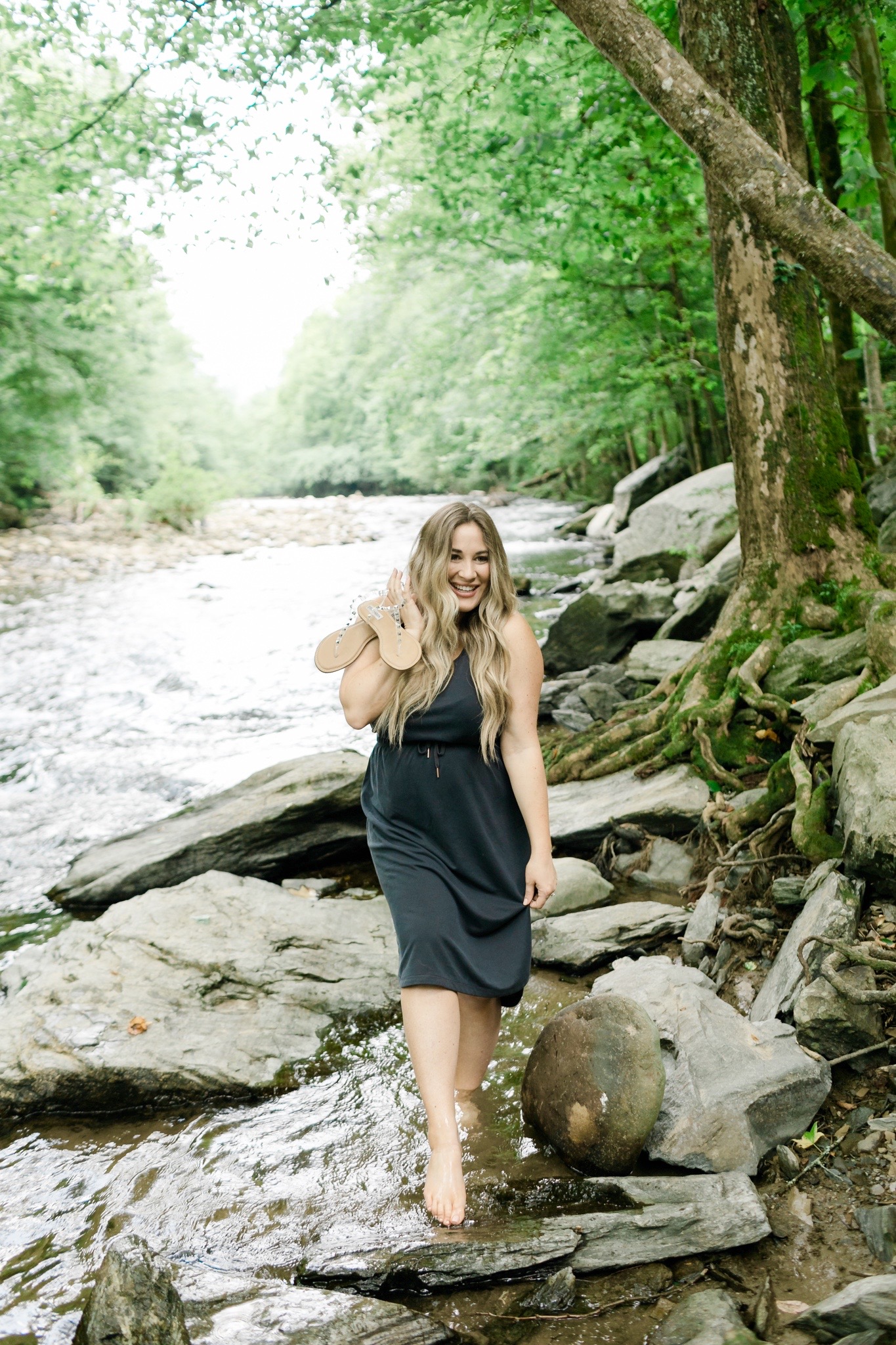 comfy casual summer outfits styled by top Memphis fashion blogger, Walking in Memphis in High Heels: image of a woman wearing an Old Navy sleeveless dress and Steve Madden clear sandals.