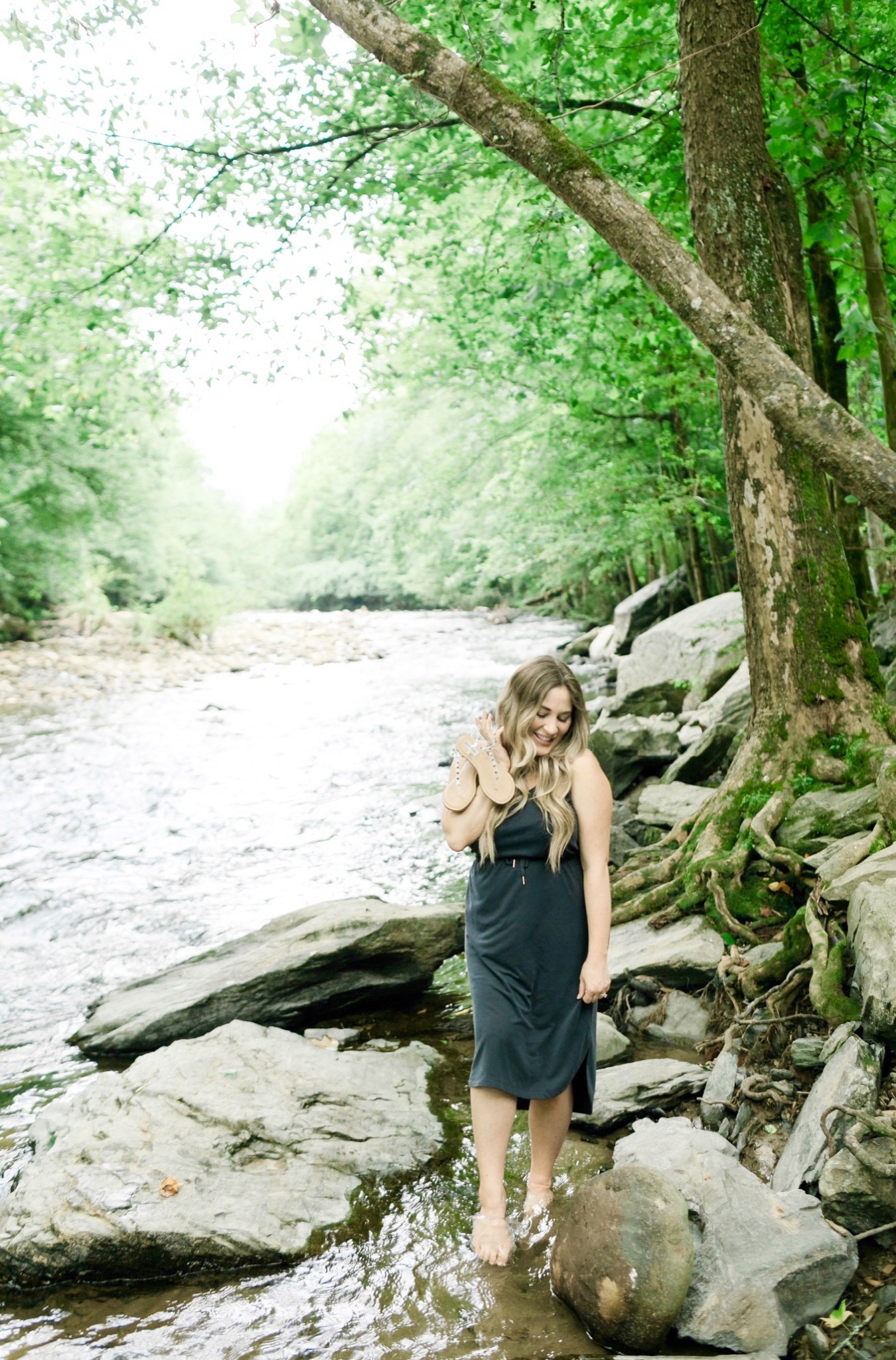 comfy casual summer outfits styled by top Memphis fashion blogger, Walking in Memphis in High Heels: image of a woman wearing an Old Navy sleeveless dress and Steve Madden clear sandals.