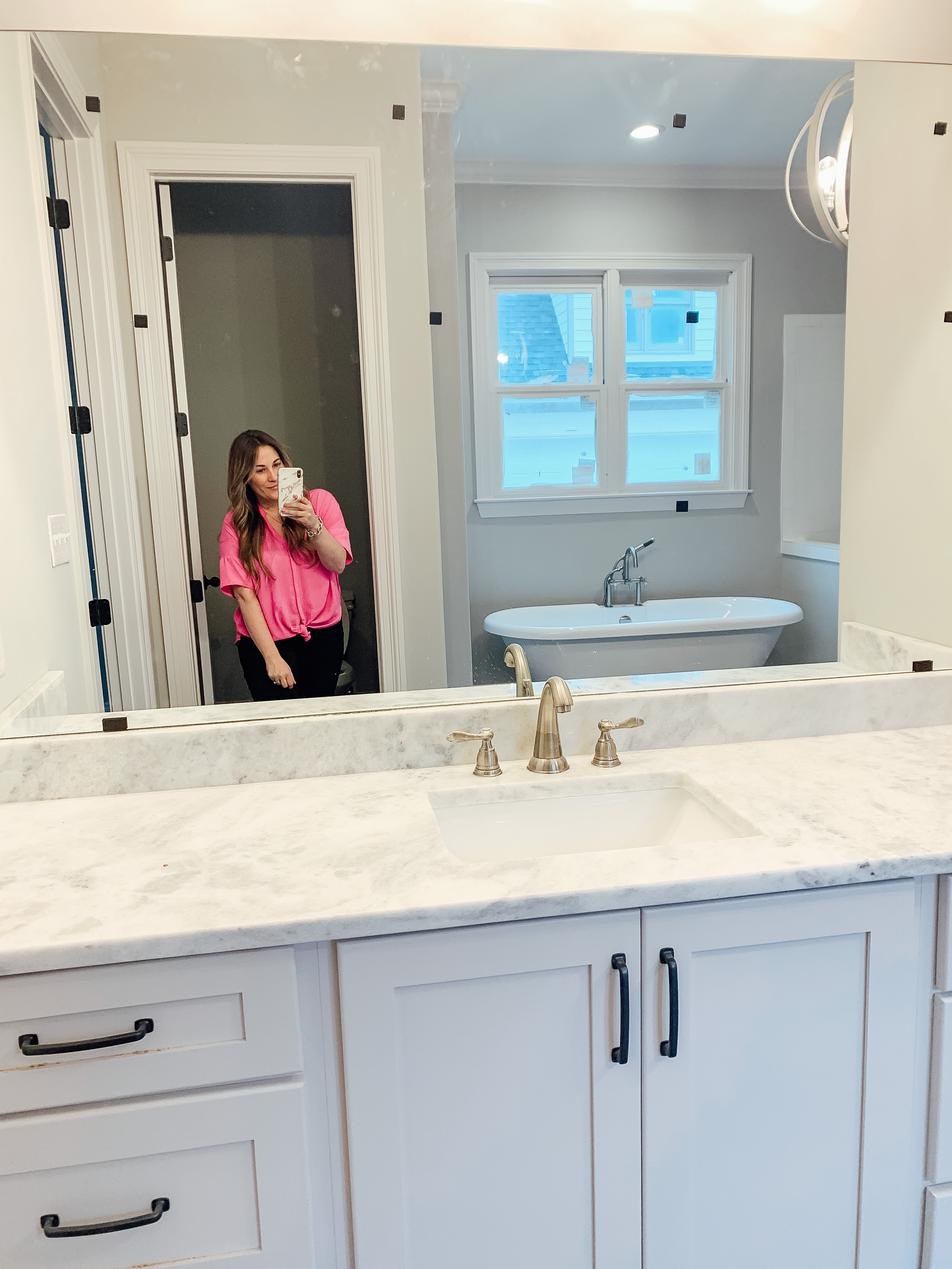 How to Update Bathroom Mirrors on a Budget, tips featured by top Memphis lifestyle blogger, Walking in Memphis in High Heels.