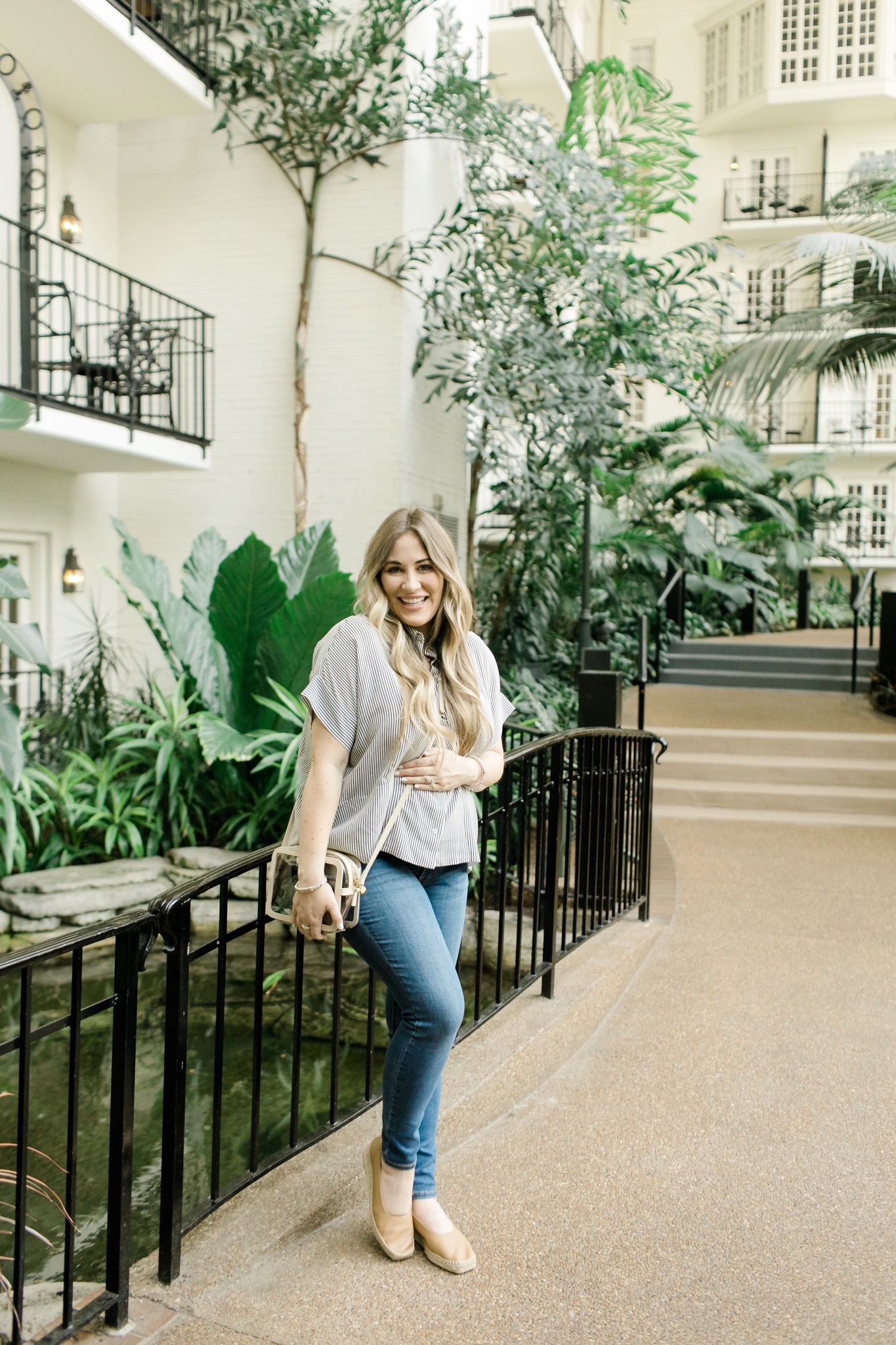 Cute fall look styled by top Memphis fashion blogger, Walking in Memphis in High Heels: image of a woman wearing an Everlane silk short tee and  Everlane espadrilles.