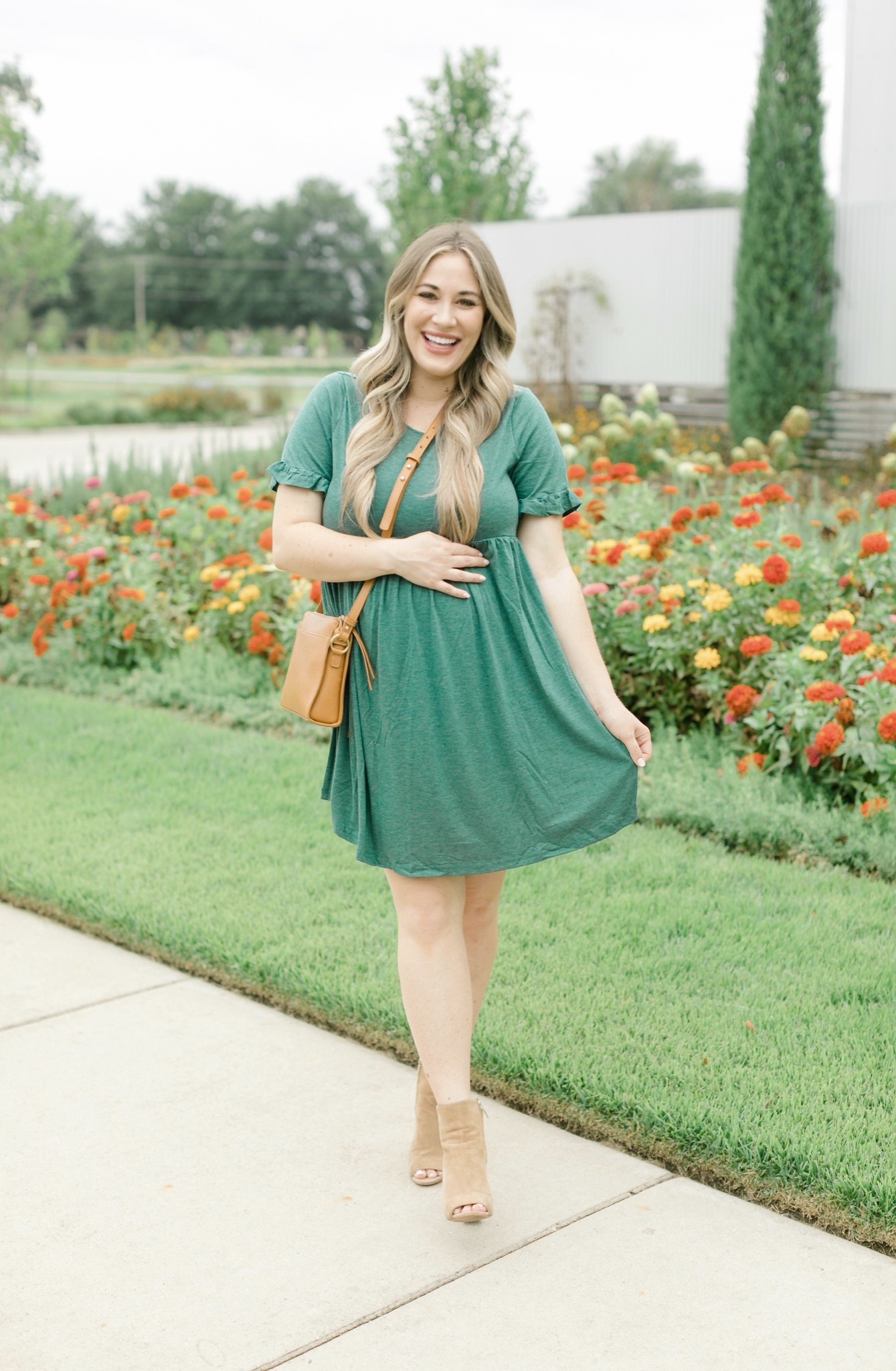 Fall style featured by top Memphis fashion blogger, Walking in Memphis in High Heels: image of a women wearing a Romwe maternity dress, Vince Camuto booties, and Gigi newYork Whitney Crossbody.