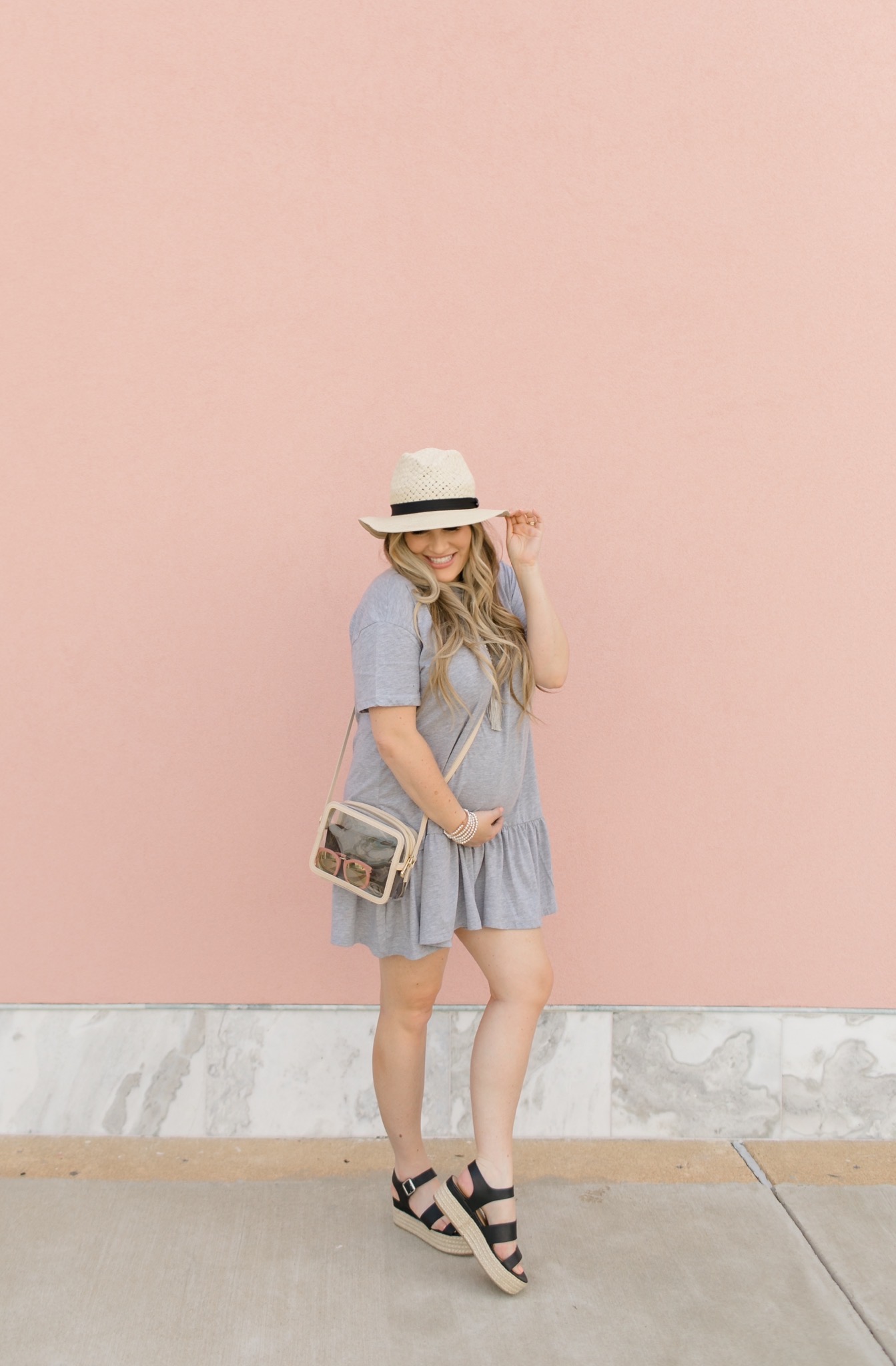 Casual maternity look feature dby top Memphis fashion blogger, Walking in Memphis in High Heels: image of a pregnant woman wearing a Nasty Gal striped tee shirt mini dress, Valett strap sandals, and a Gigi NewYork Collins Crossbody