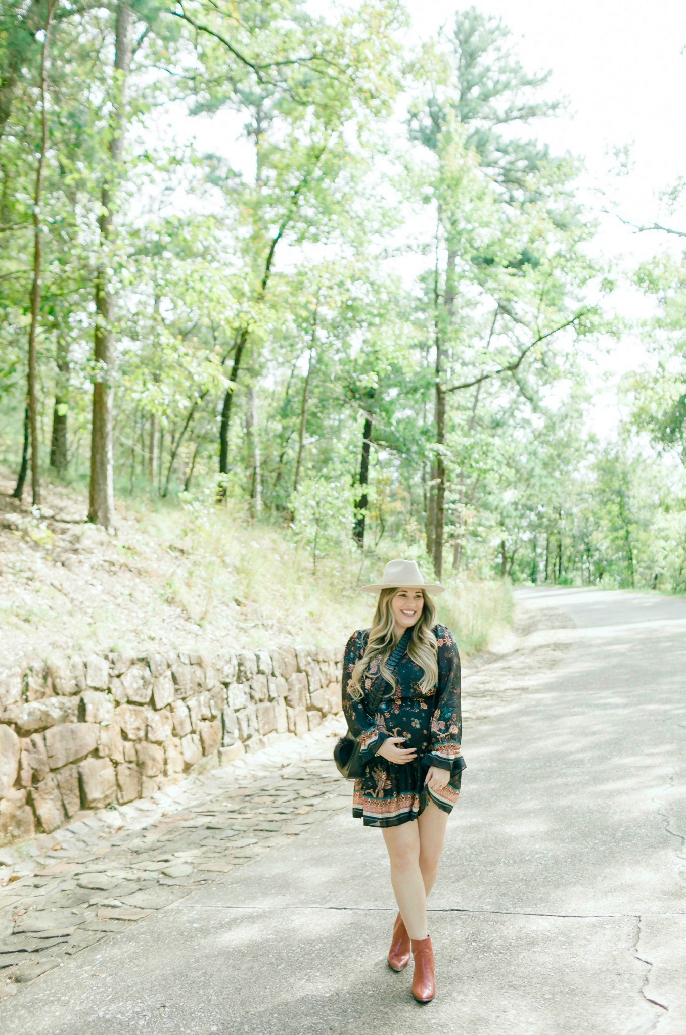 Cute Thanksgiving looks featured by top Memphis fashion blogger, Walking in Memphis in High Heels> image of a pregnant woman wearing a Red Dress floral dress, a Red Dress panama hat, Red Dress brown booties.