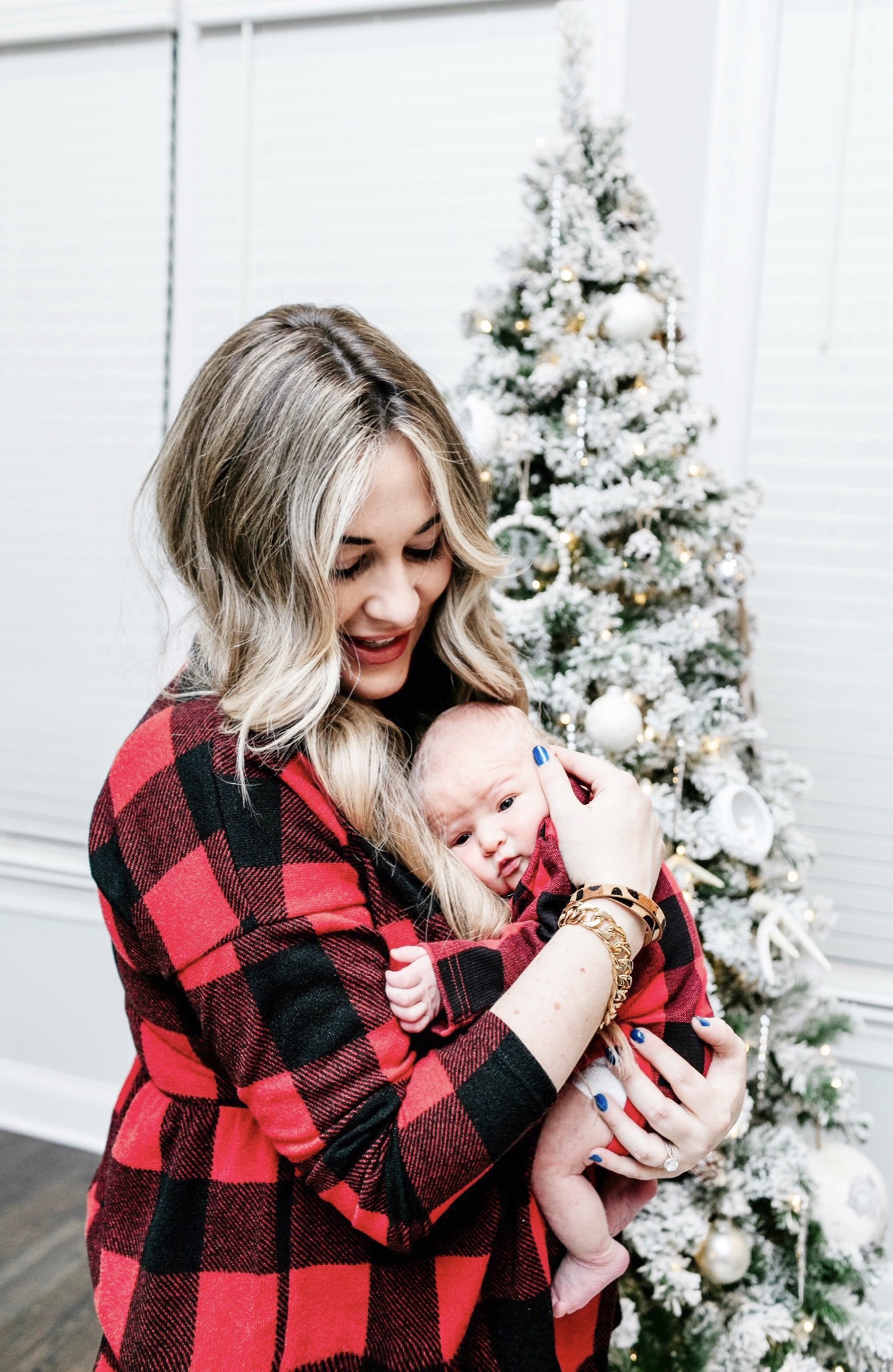 Cute winter prints and patterns featured by top Memphis fashion blogger, Walking in Memphis in High Heels: image of a woman wearing a Pink Lily buffalo plaid shirt