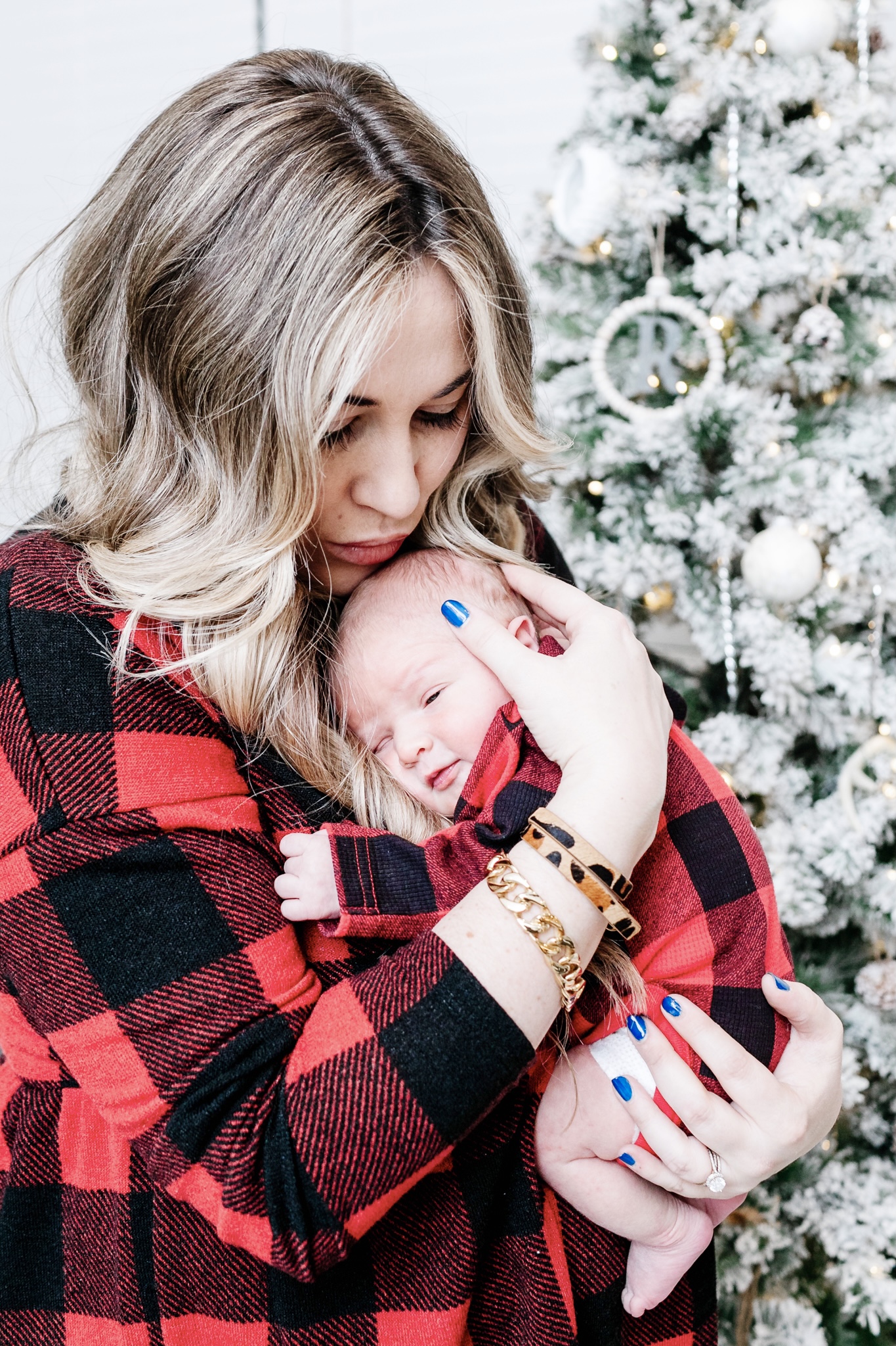 Cute winter prints and patterns featured by top Memphis fashion blogger, Walking in Memphis in High Heels: image of a woman wearing a Pink Lily buffalo plaid shirt