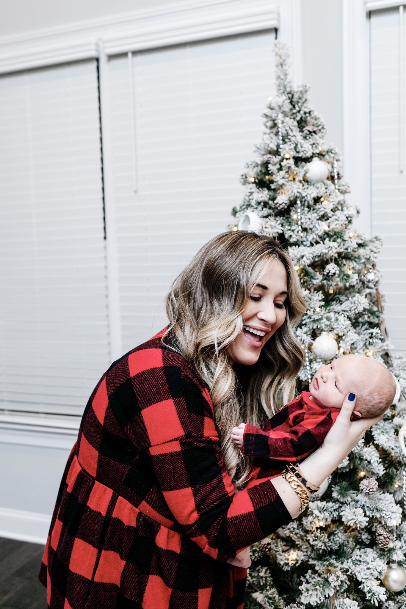 Cute winter prints and patterns featured by top Memphis fashion blogger, Walking in Memphis in High Heels: image of a woman wearing a Pink Lily buffalo plaid shirt