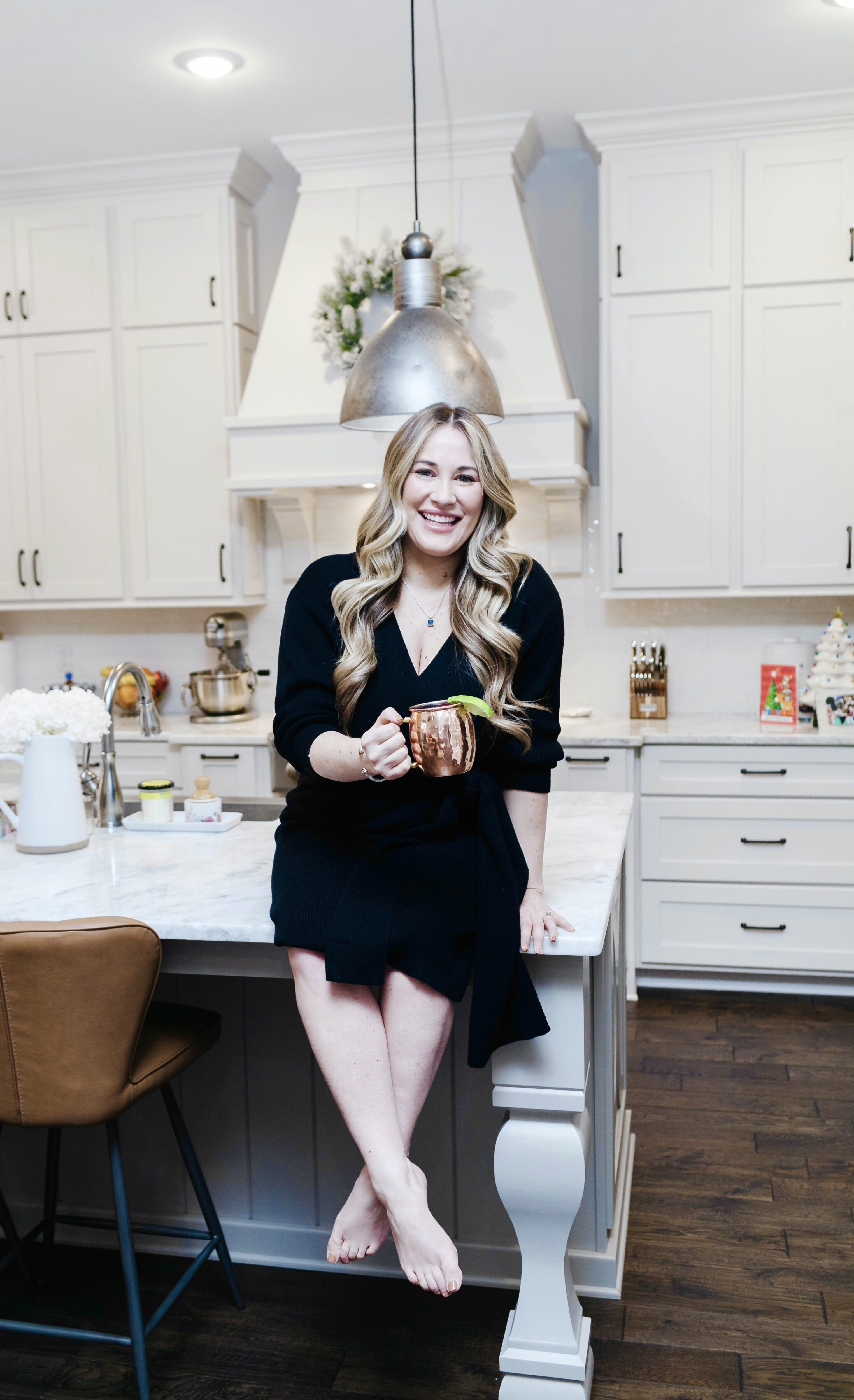 black monochrome outfit styled by top Memphis fashion blogger, Walking in Memphis in High Heels: image of a woman wearing a black LEITH sweater dress