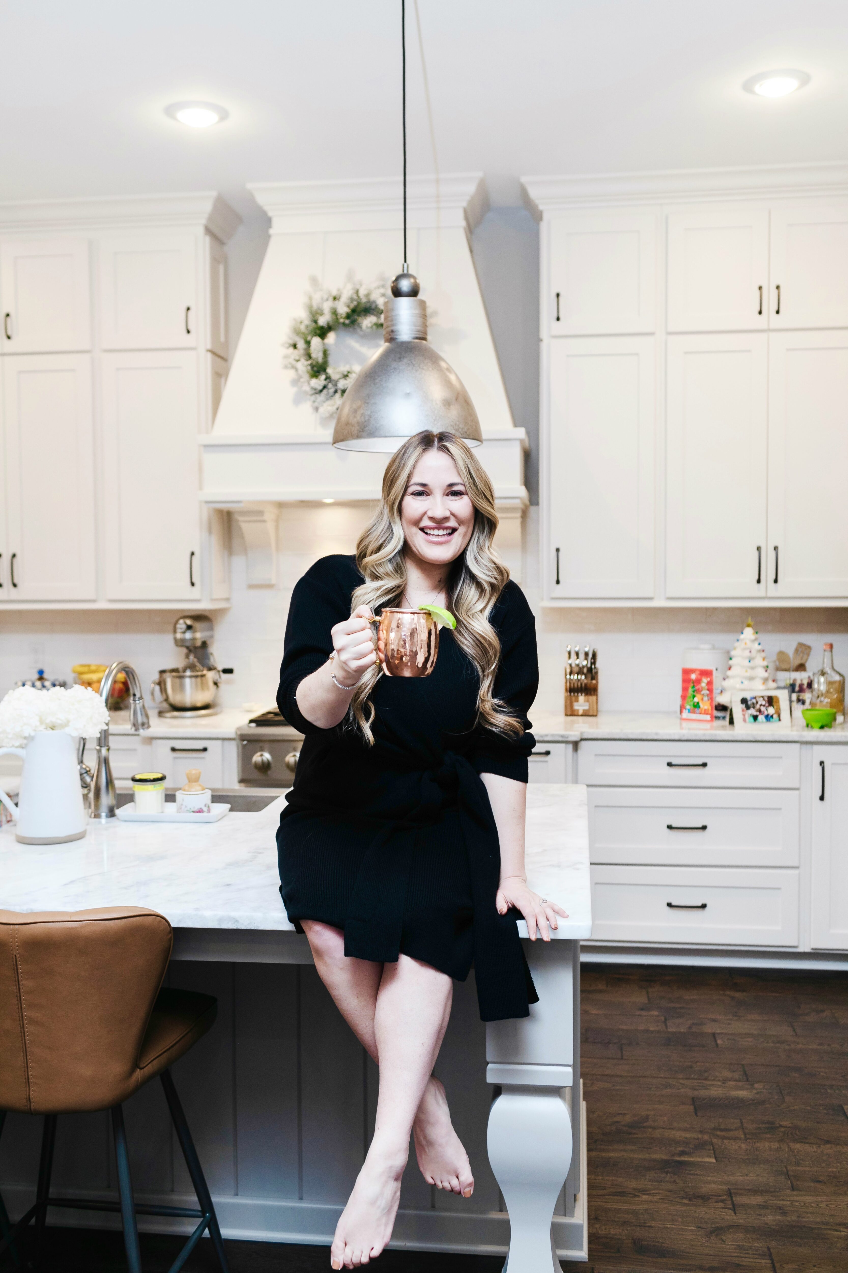 black monochrome outfit styled by top Memphis fashion blogger, Walking in Memphis in High Heels: image of a woman wearing a black LEITH sweater dress