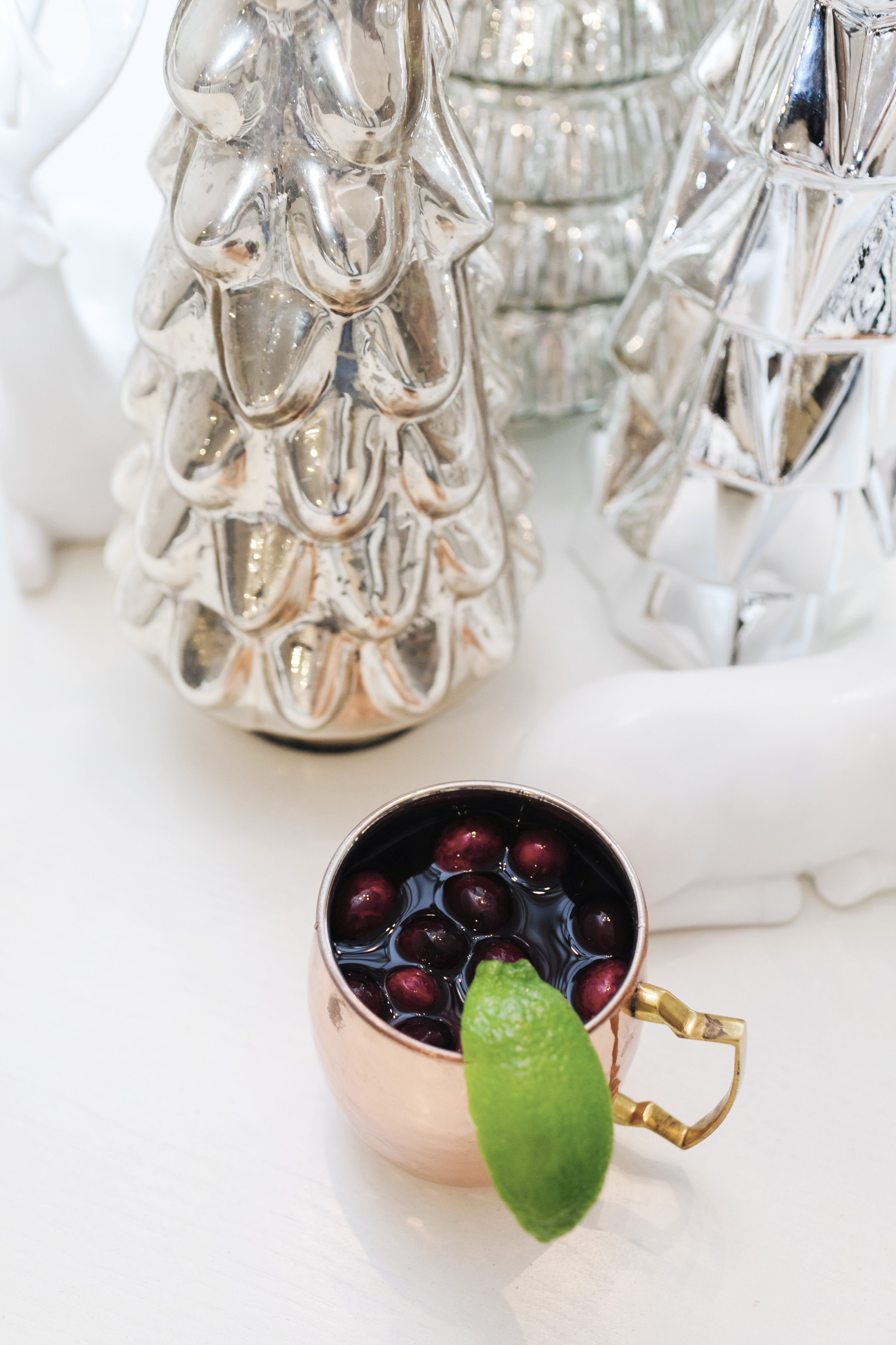 Holiday Cocktail: Cranberry Moscow Mule Recipe featured by top Memphis lifestyle blogger, Walking in Memphis in High Heels.