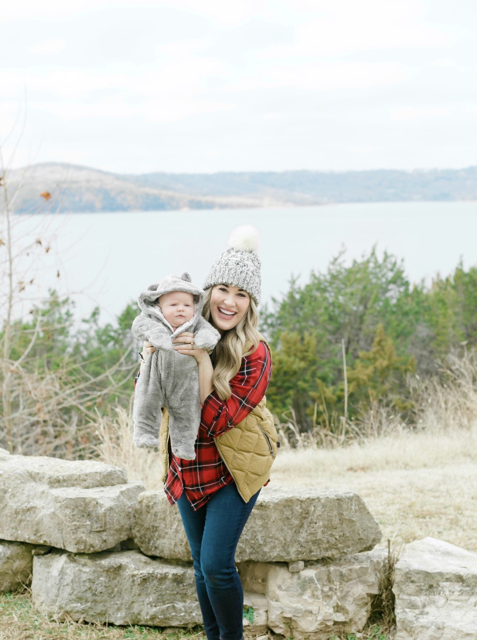 Cute beanies for women featured by top Memphis fashion blogger, Walking in Memphis in High Heels, image of a woman wearing an Altar'd State pom beanie