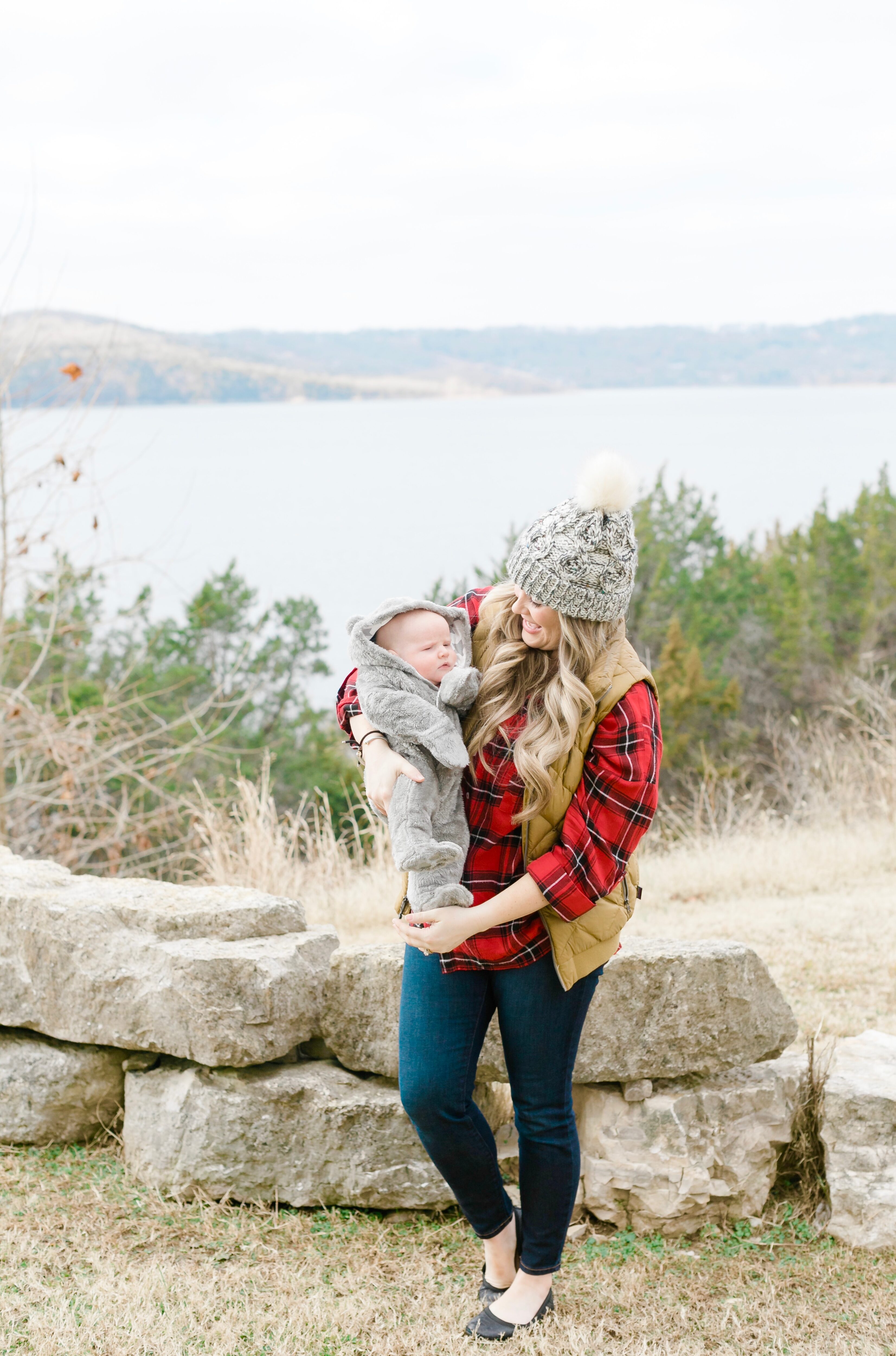 Cute beanies for women featured by top Memphis fashion blogger, Walking in Memphis in High Heels, image of a woman wearing an Altar'd State pom beanie