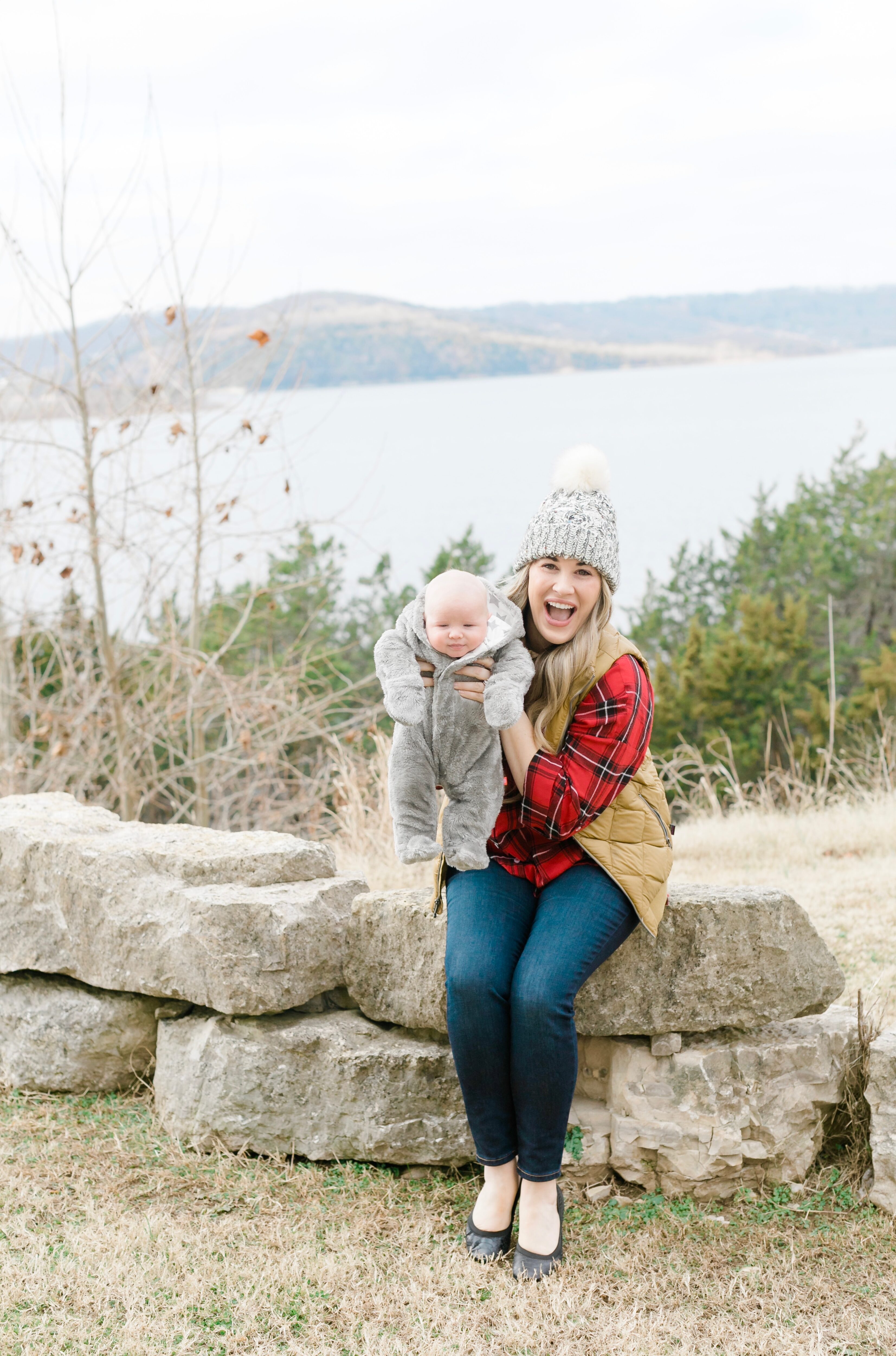 Cute beanies for women featured by top Memphis fashion blogger, Walking in Memphis in High Heels, image of a woman wearing an Altar'd State pom beanie