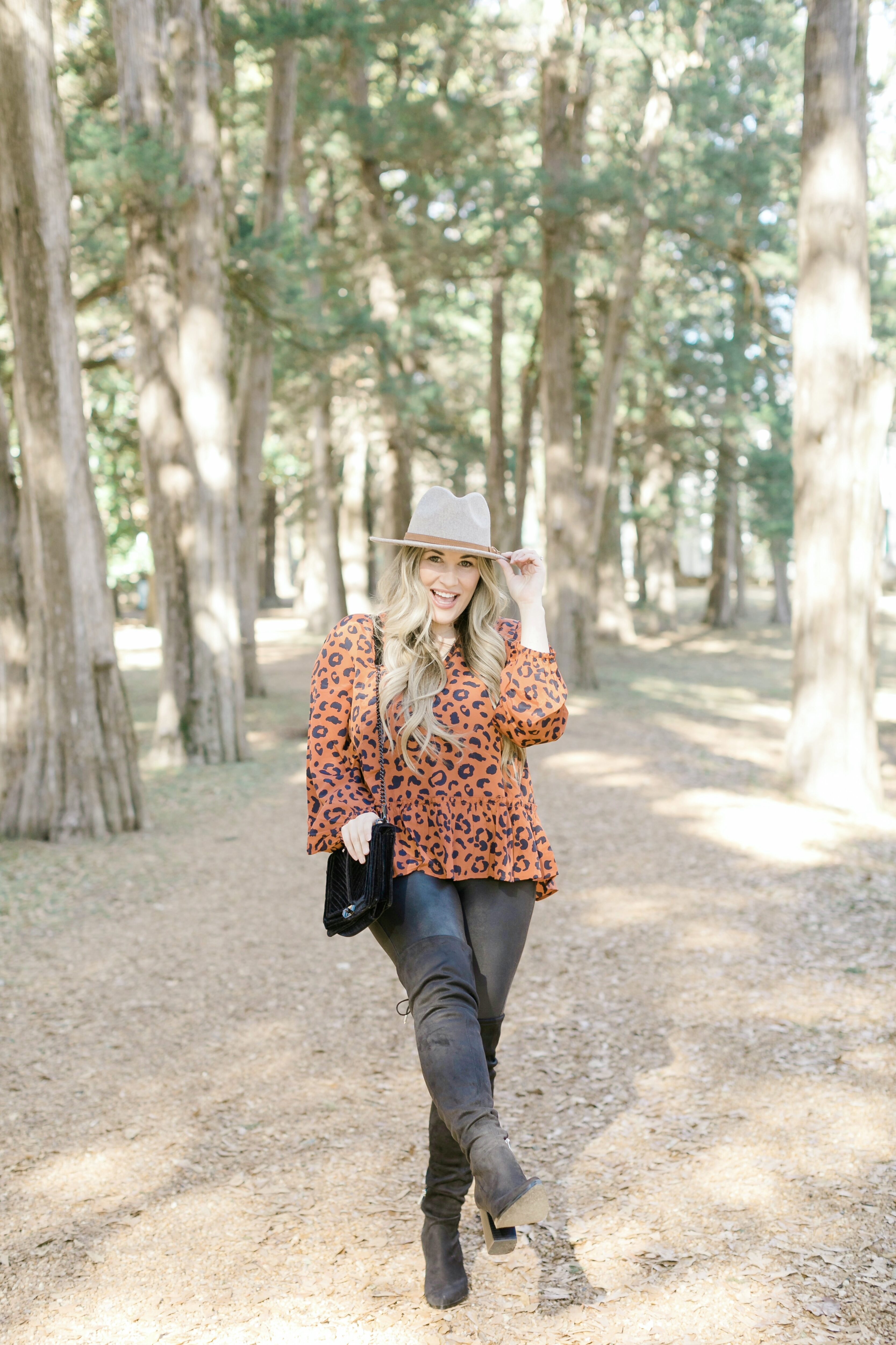 Spanx faux leather leggings styled by top Memphis fashion blogger, Walking in Memphis in High Heels.