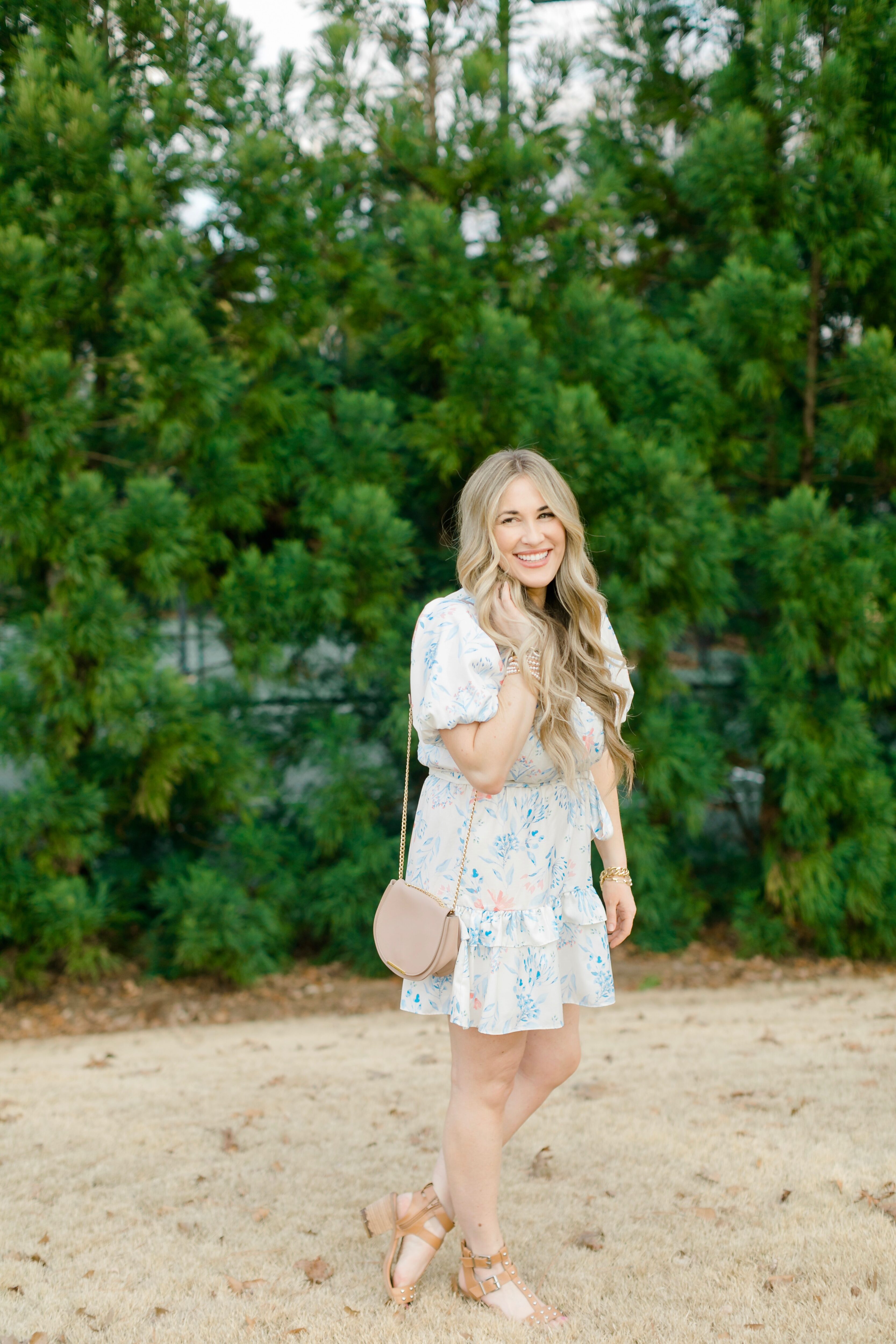 Cute Easter dresses for Women featured by top Memphis fashion blogger, Walking in Memphis in High Heels: image of a woman wearing a Red Dress Boutique floral dress.