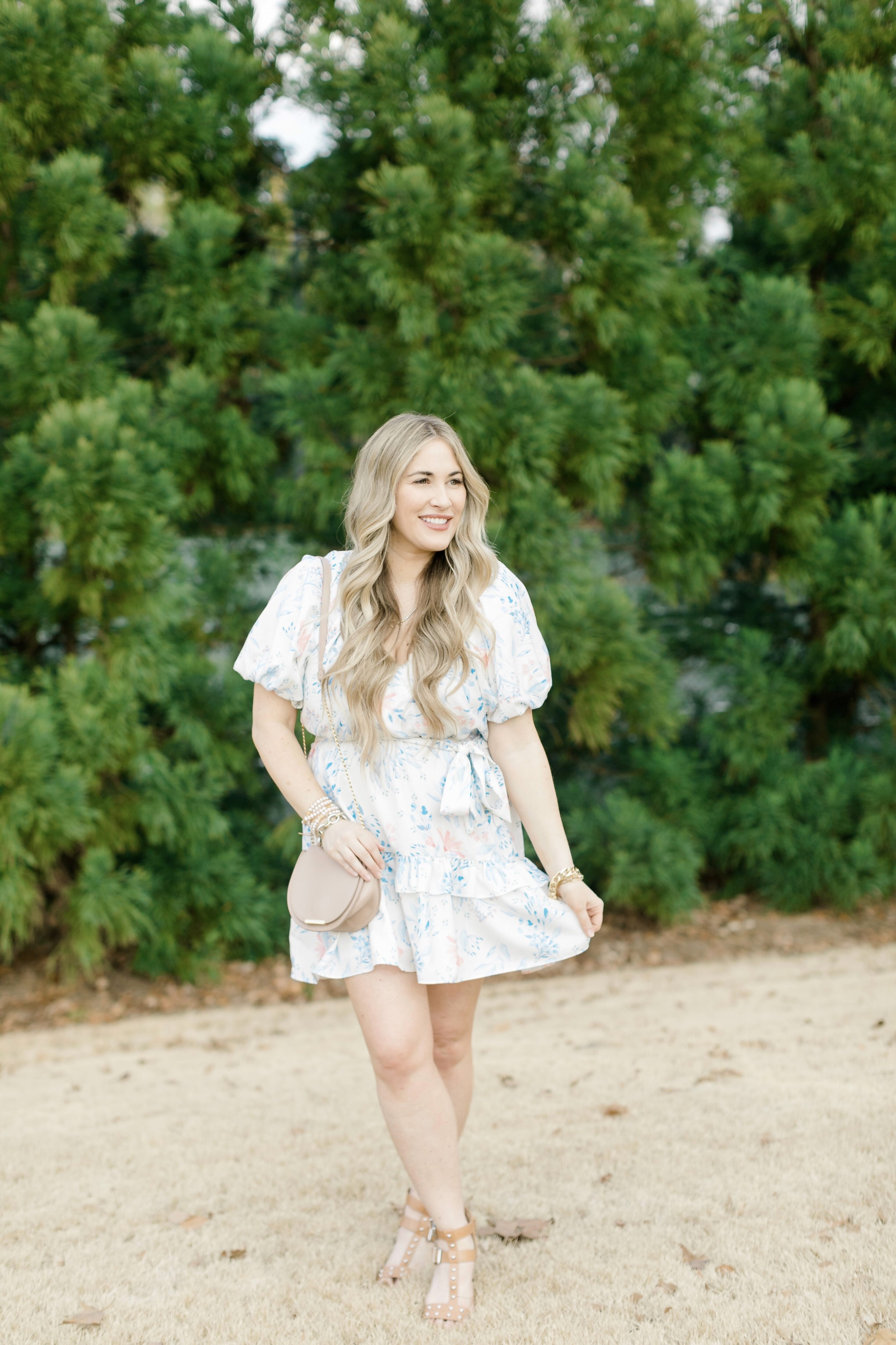 Cute Easter dresses for Women featured by top Memphis fashion blogger, Walking in Memphis in High Heels: image of a woman wearing a Red Dress Boutique floral dress.