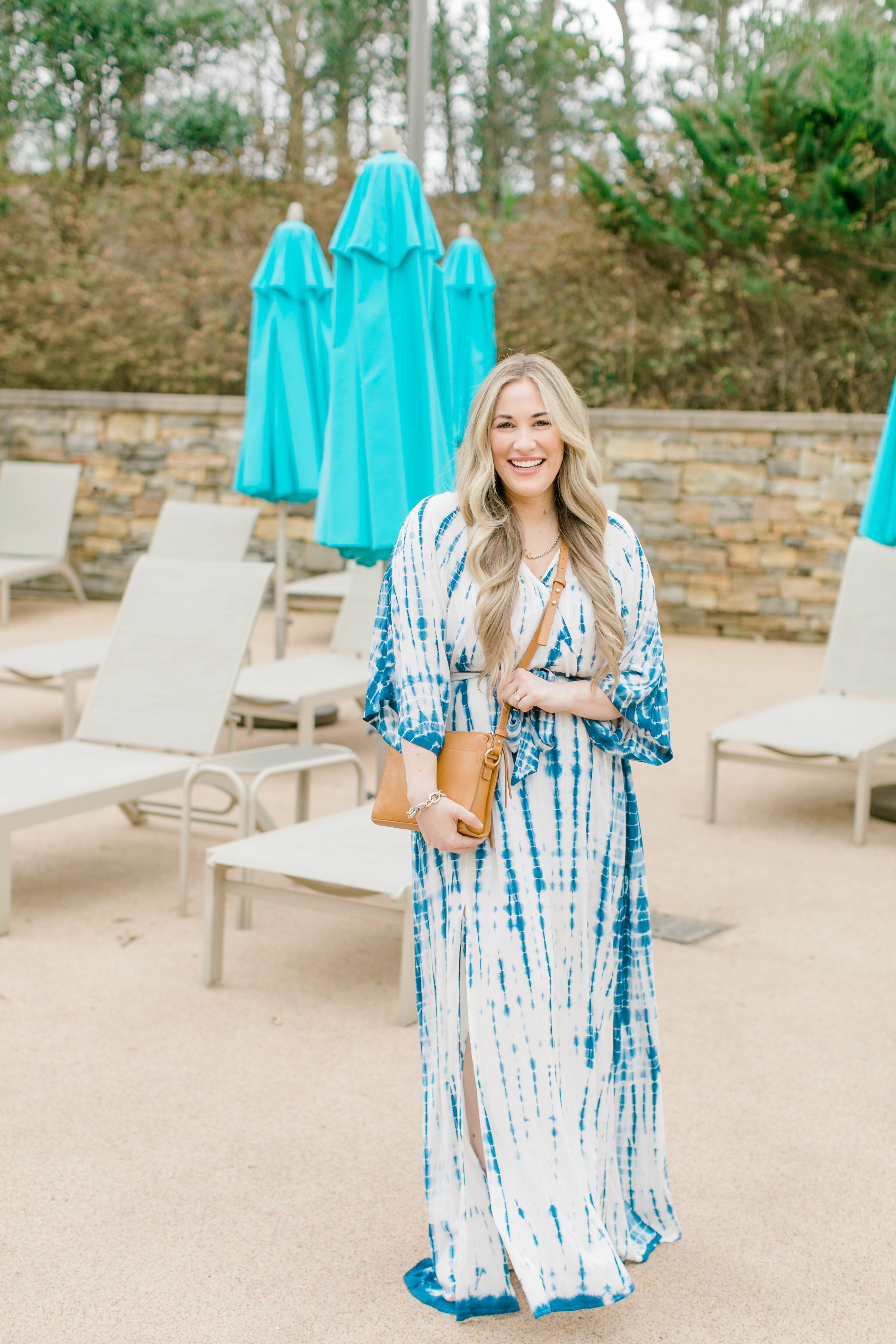 Cute spring sandals featured by top Memphis fashion blogger, Walking in Memphis in High Heels: image of a woman wearing Marc Fisher wedge espadrilles.