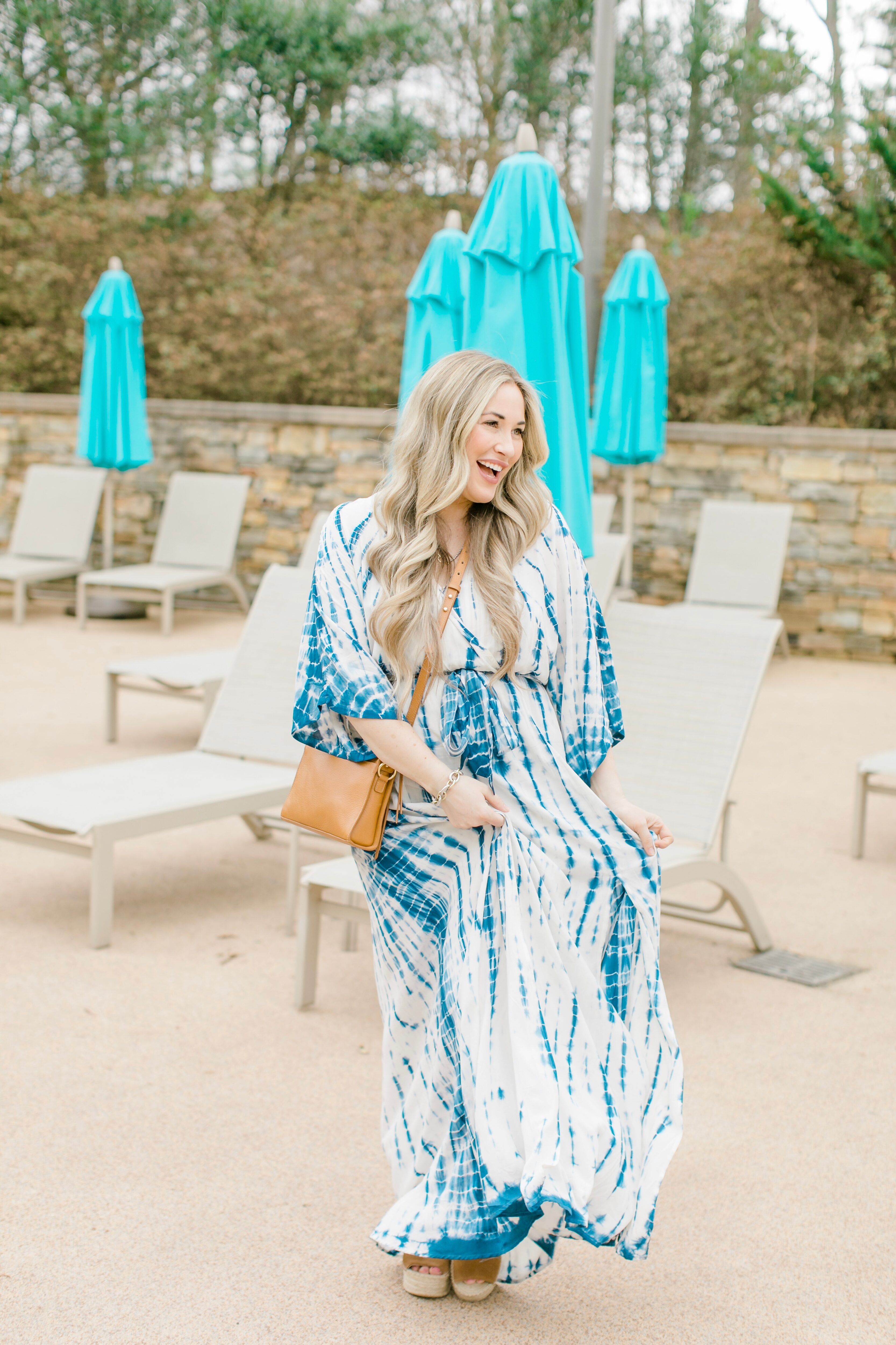 Cute spring sandals featured by top Memphis fashion blogger, Walking in Memphis in High Heels: image of a woman wearing Marc Fisher wedge espadrilles.