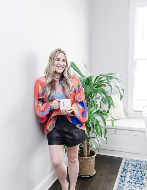 Best Flattering Shorts to Wear this Spring featured by top Memphis fashion blogger, Walking in Memphis in High Heels: image of a woman wearing Topshop faux leather shorts.