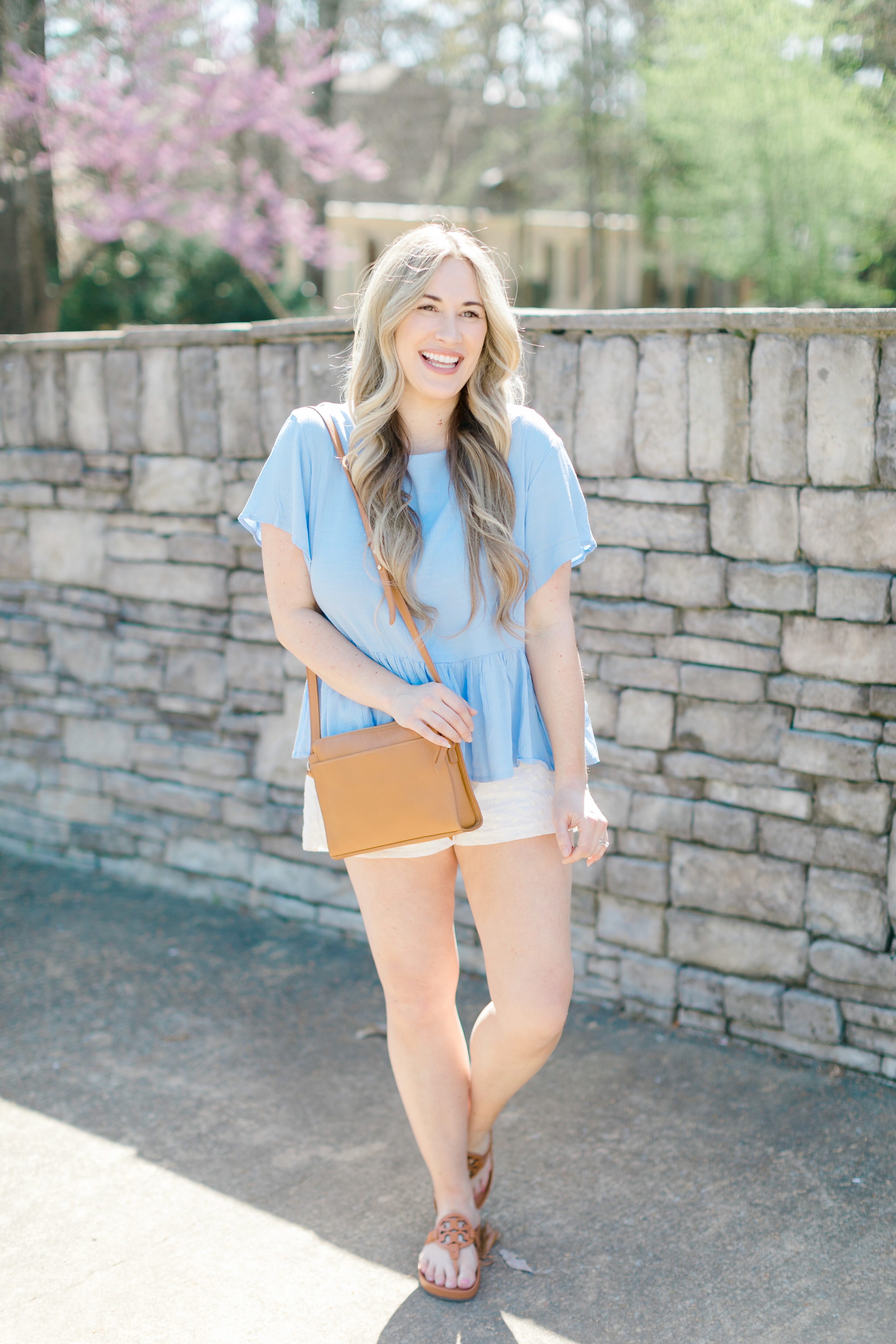 Cute spring shorts for women styled by top Memphis fashion blogger, Walking in Memphis in High Heels: image of a woman wearing Altar'd State shorts