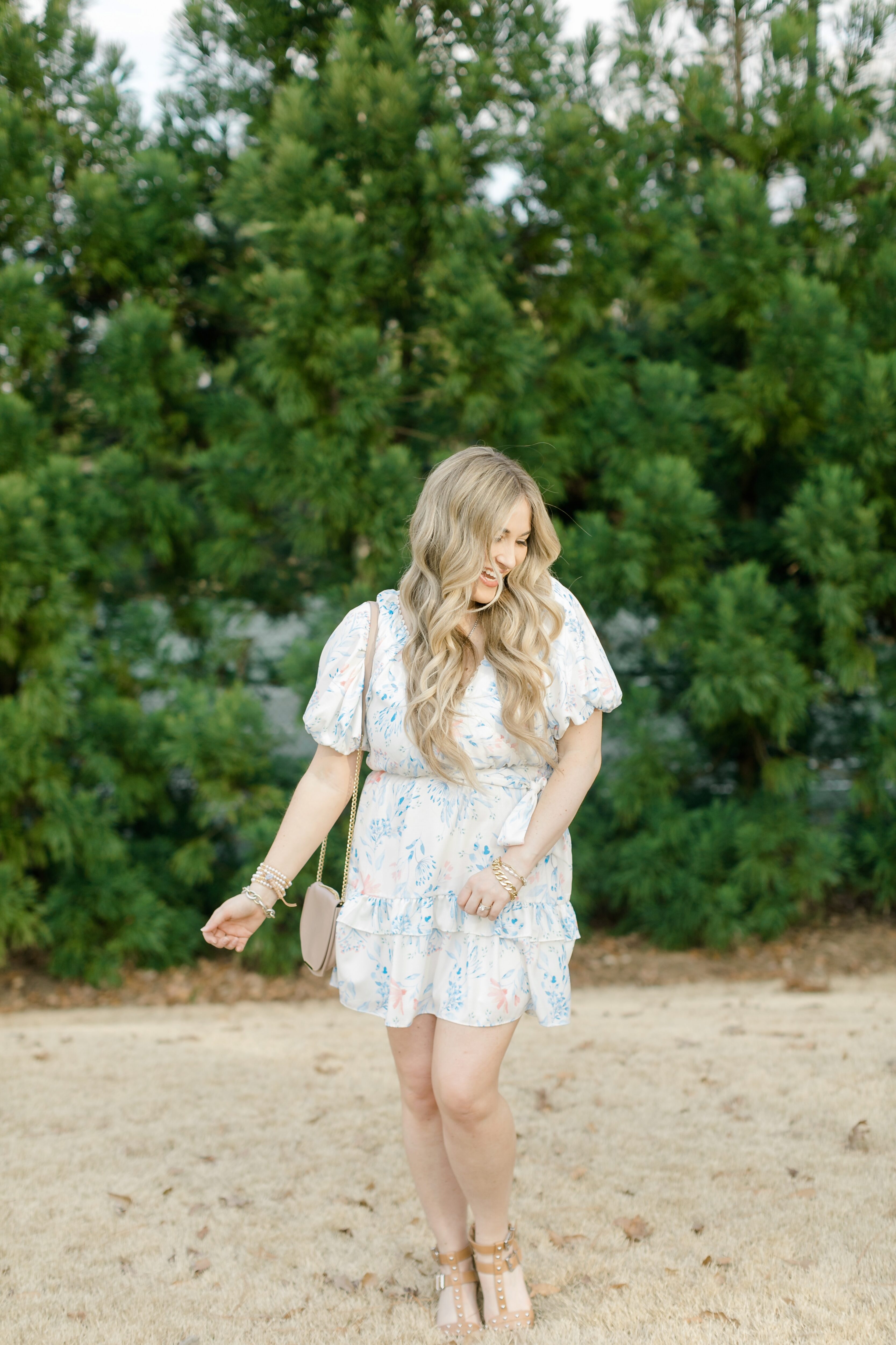 Cute Easter dresses for Women featured by top Memphis fashion blogger, Walking in Memphis in High Heels: image of a woman wearing a Red Dress Boutique floral dress.