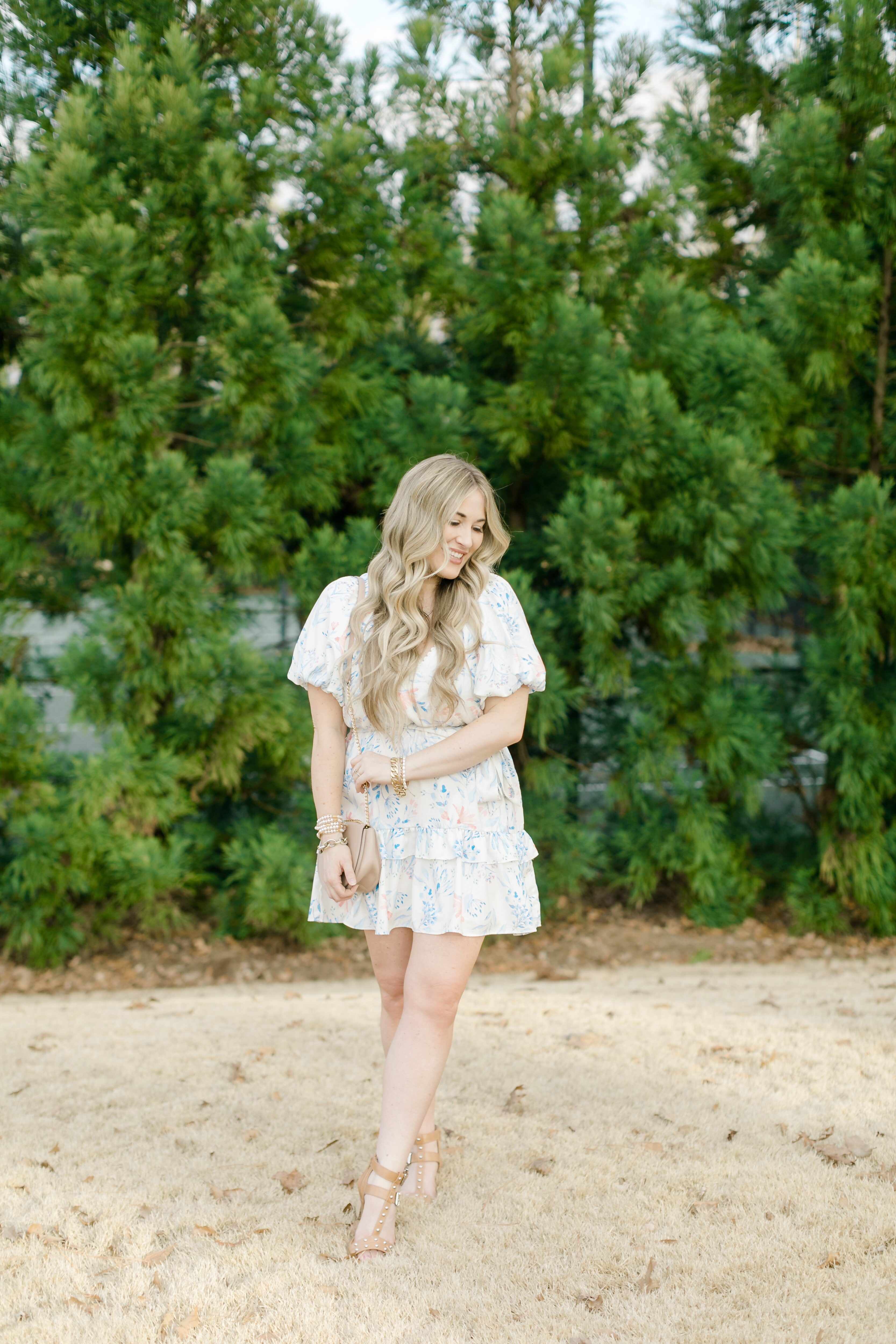 Cute Easter dresses for Women featured by top Memphis fashion blogger, Walking in Memphis in High Heels: image of a woman wearing a Red Dress Boutique floral dress.