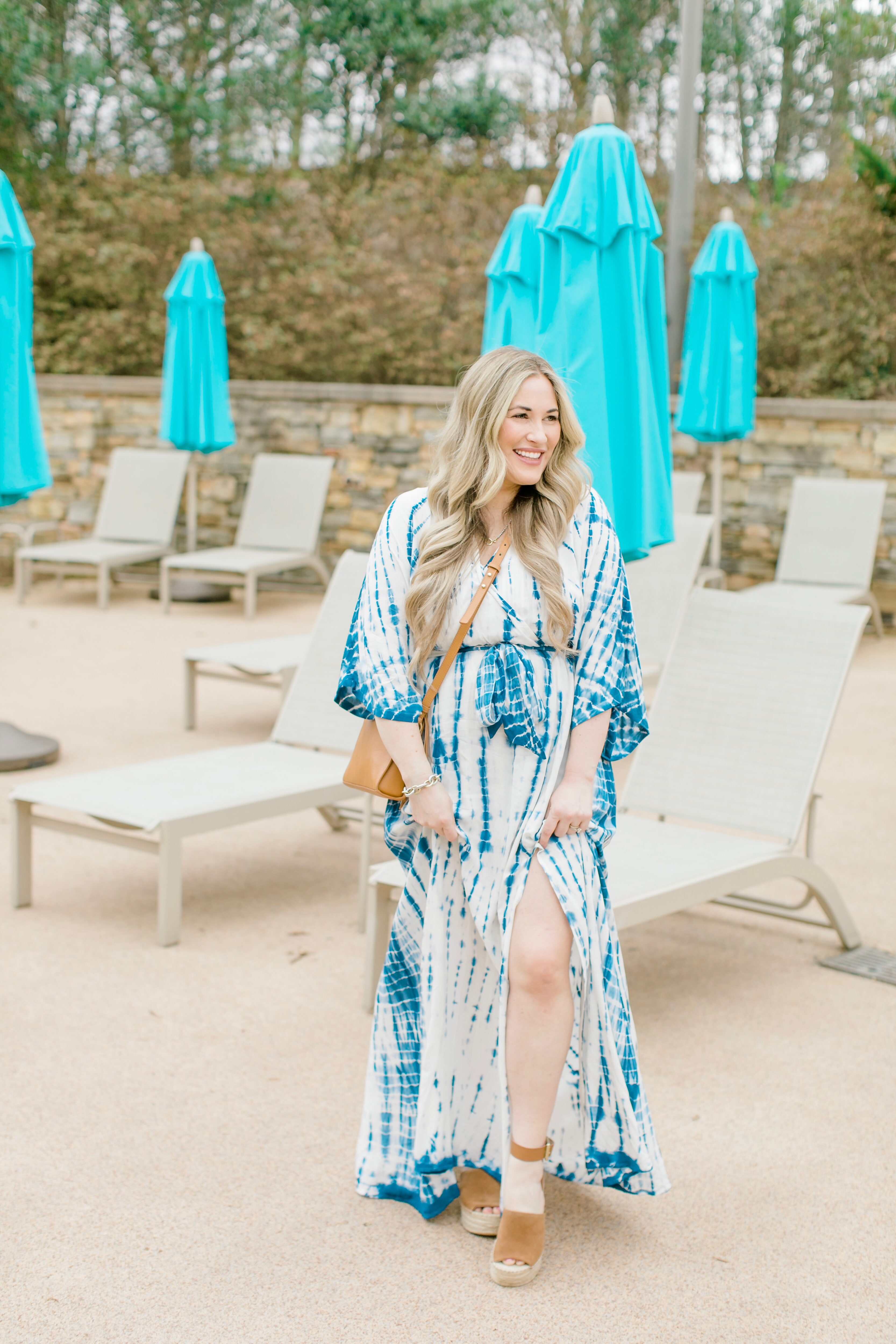 Cute spring sandals featured by top Memphis fashion blogger, Walking in Memphis in High Heels: image of a woman wearing Marc Fisher wedge espadrilles.