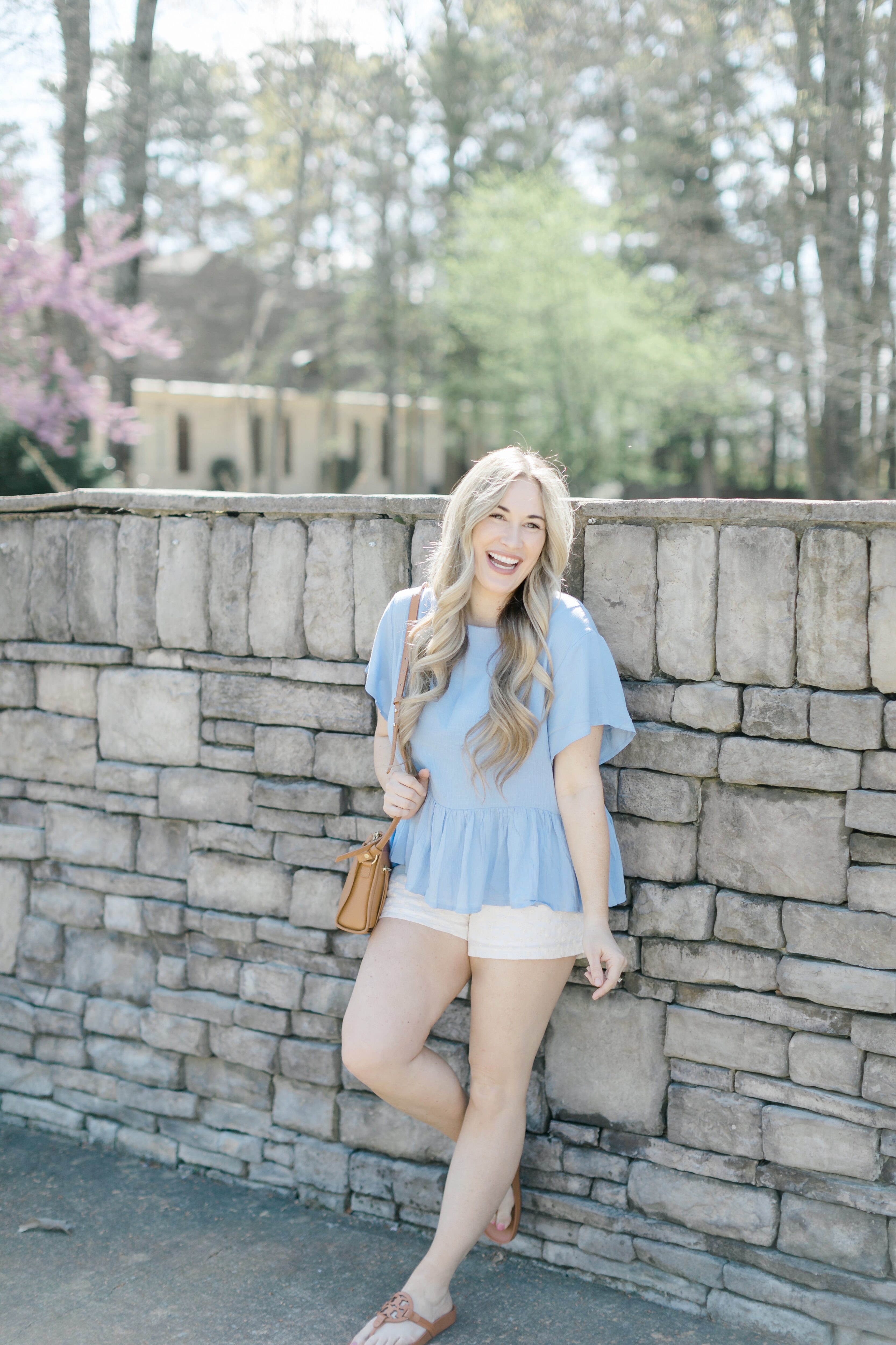 Cute spring shorts for women styled by top Memphis fashion blogger, Walking in Memphis in High Heels: image of a woman wearing Altar'd State shorts
