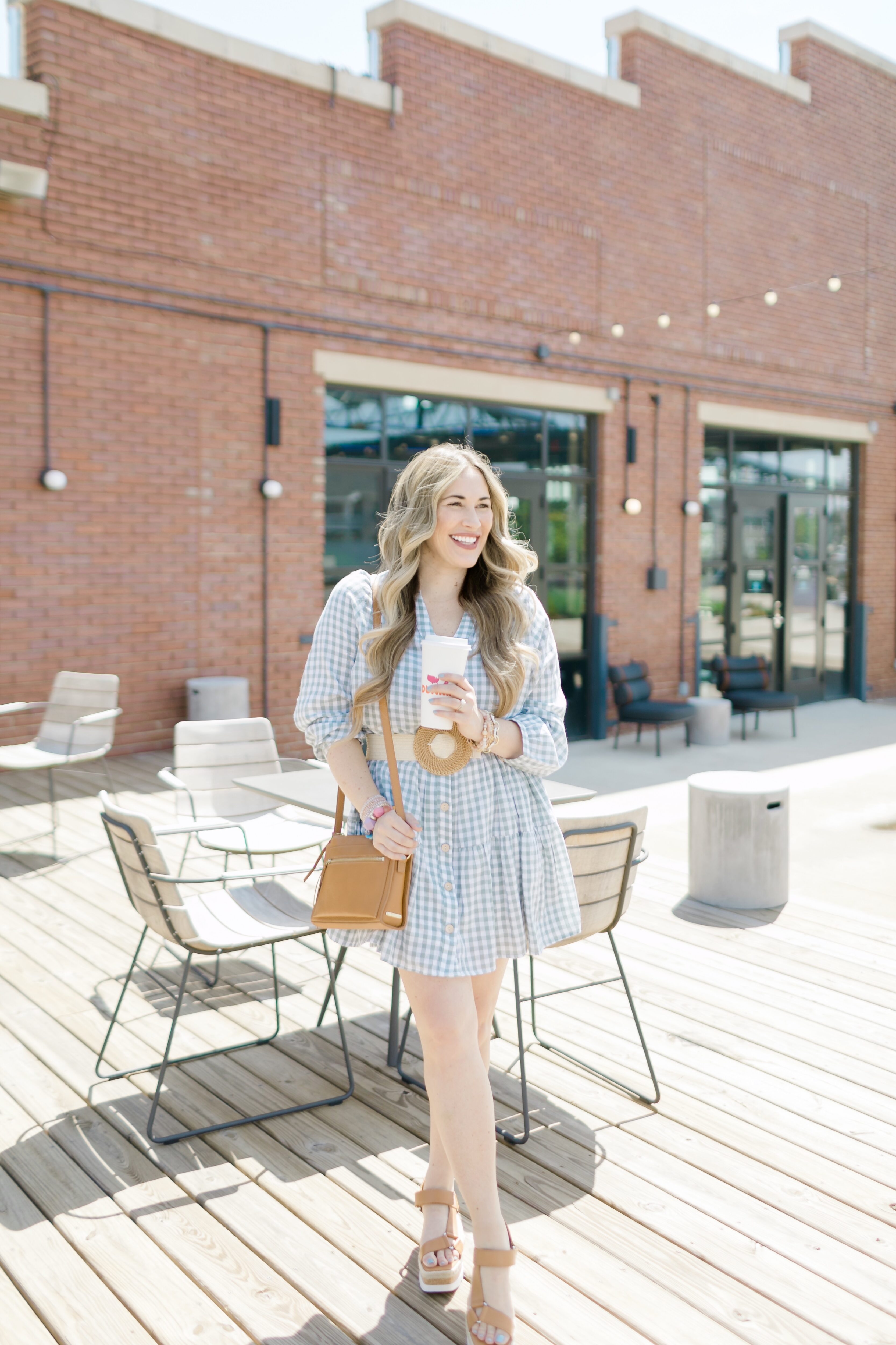 Cute Spring look styled by top Memphis fashion blogger, Walking in Memphis in High Heels: image of a woman wearing a Red Dress Boutique Gingham Dress.