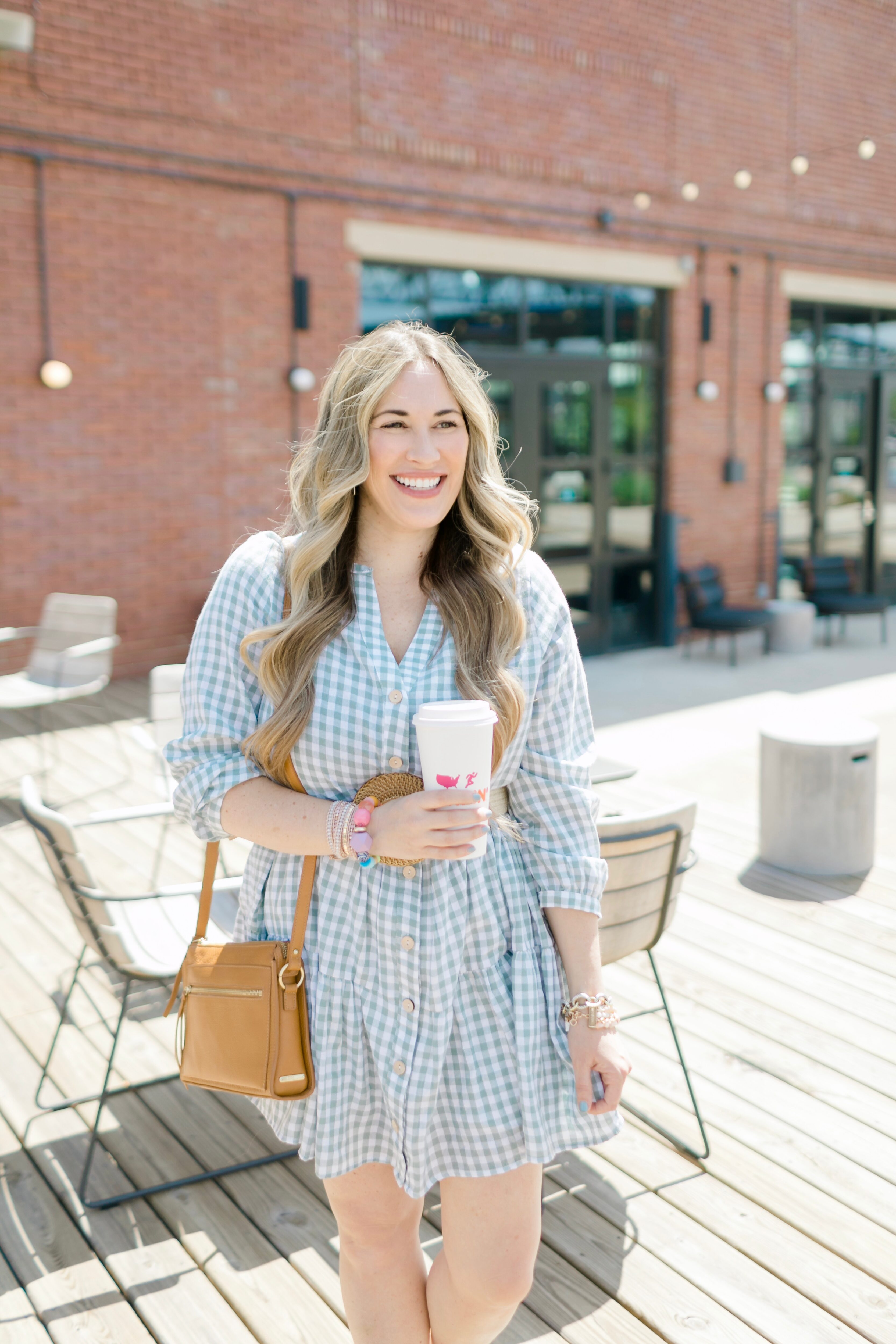 Cute Spring look styled by top Memphis fashion blogger, Walking in Memphis in High Heels: image of a woman wearing a Red Dress Boutique Gingham Dress.