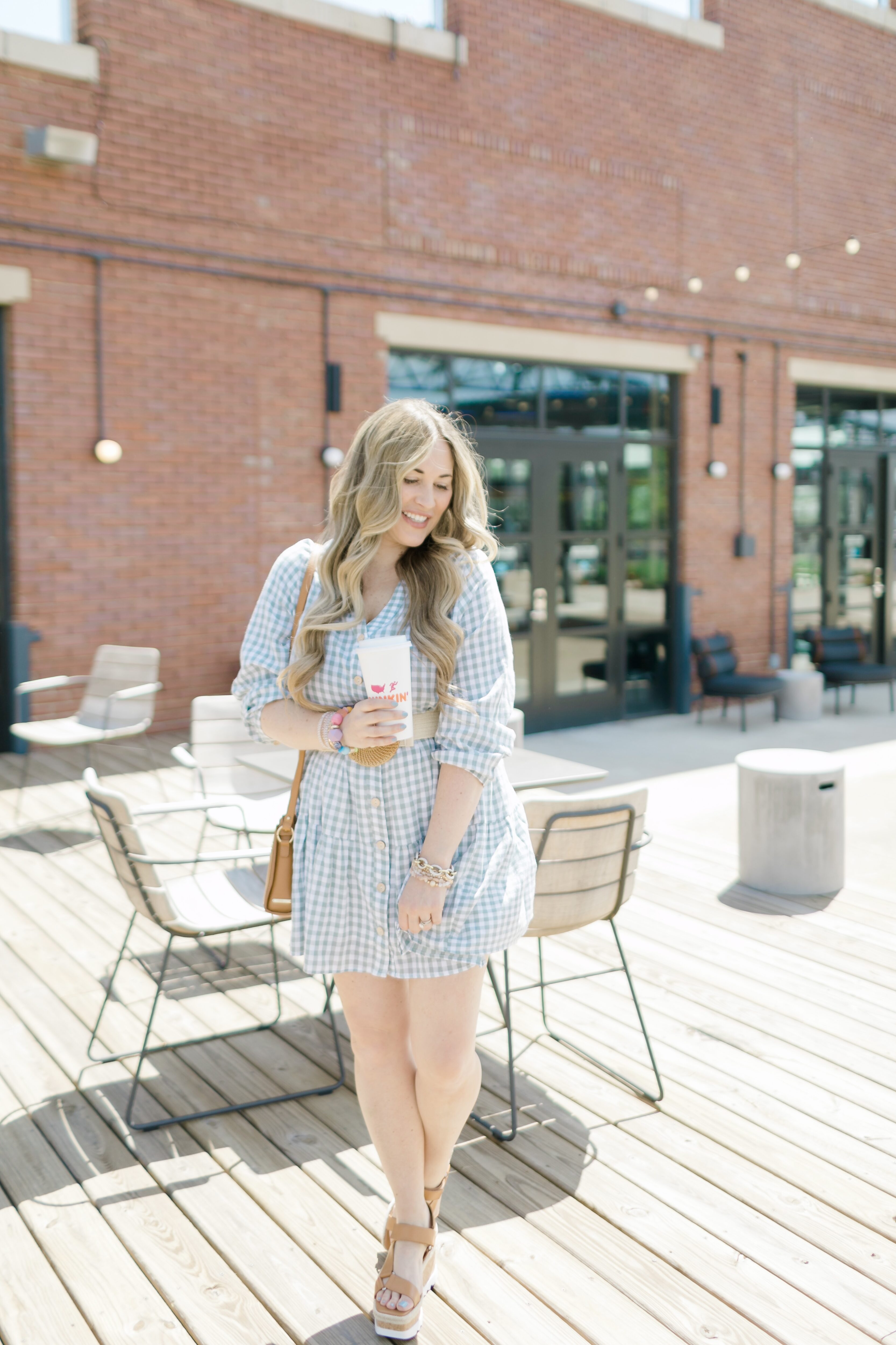 Cute Spring look styled by top Memphis fashion blogger, Walking in Memphis in High Heels: image of a woman wearing a Red Dress Boutique Gingham Dress.