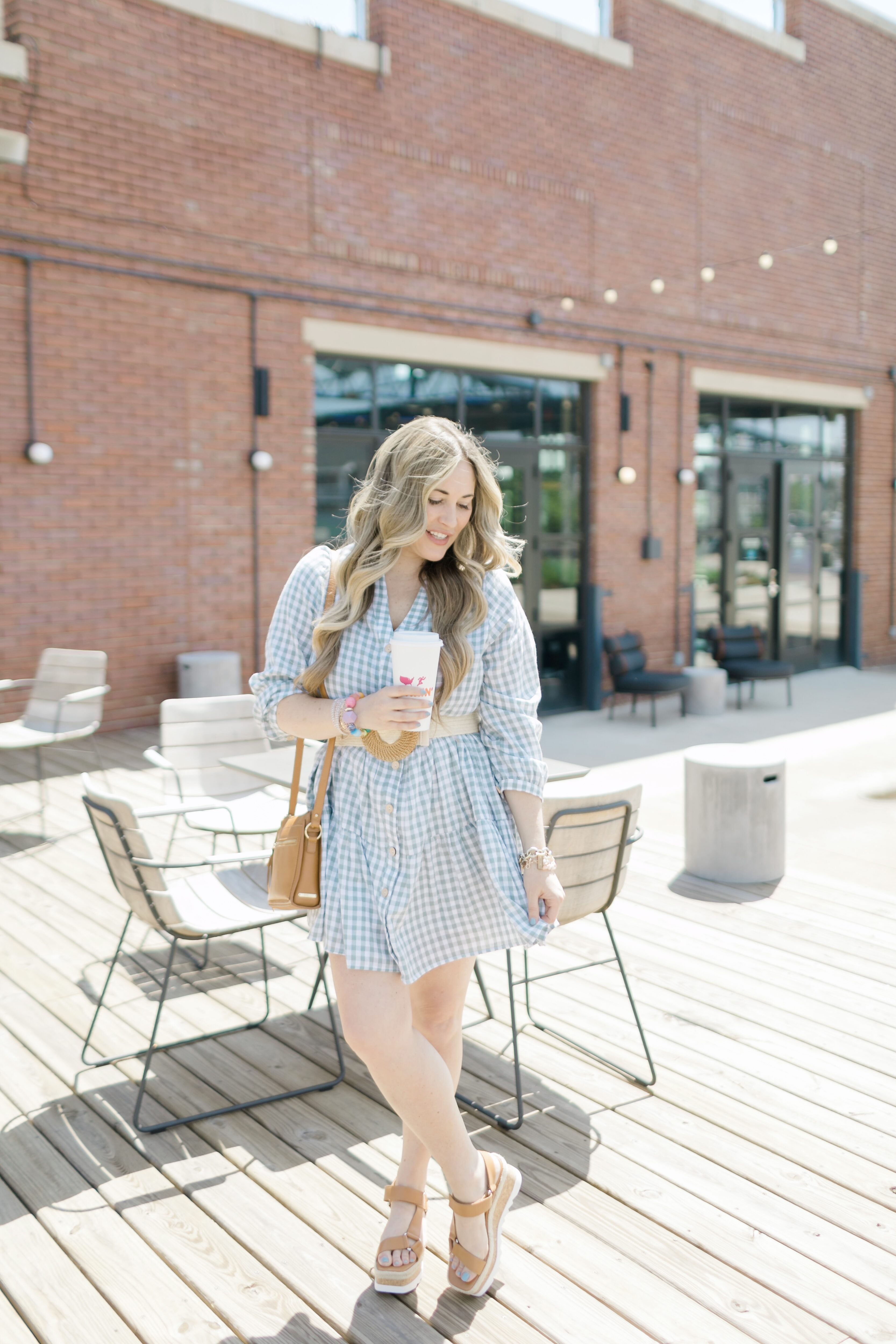 Cute Spring look styled by top Memphis fashion blogger, Walking in Memphis in High Heels: image of a woman wearing a Red Dress Boutique Gingham Dress.