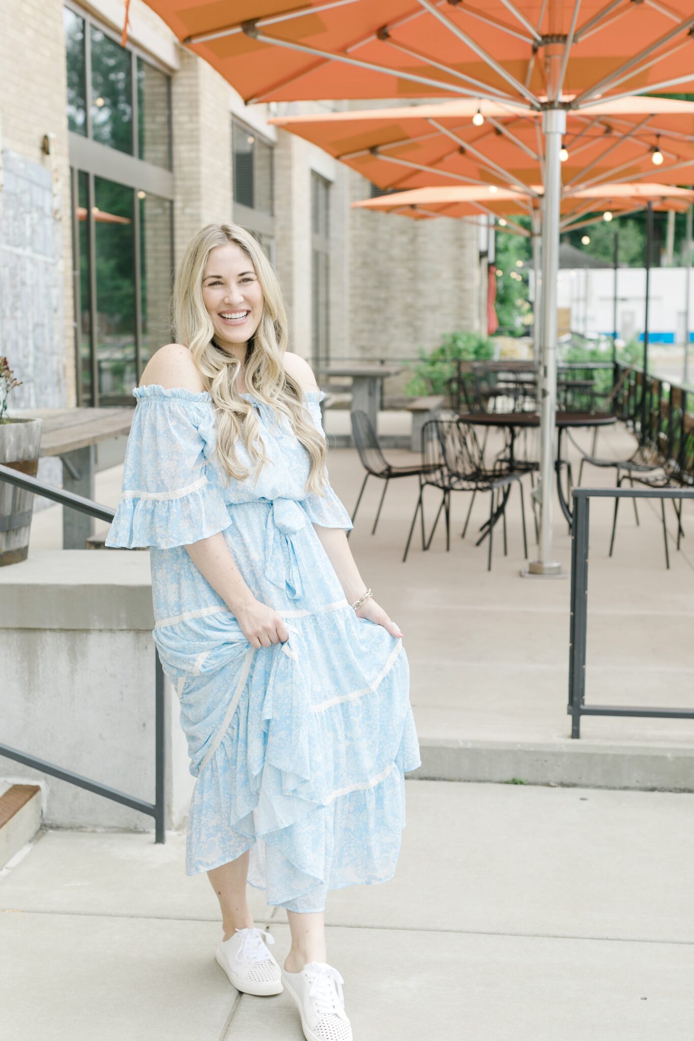 Midi and Maxi dresses for summer featured by top Memphis fashion blogger, Walking in Memphis in High Heels: image of a woman wearing a Pink Blush blue maxi floral dress.