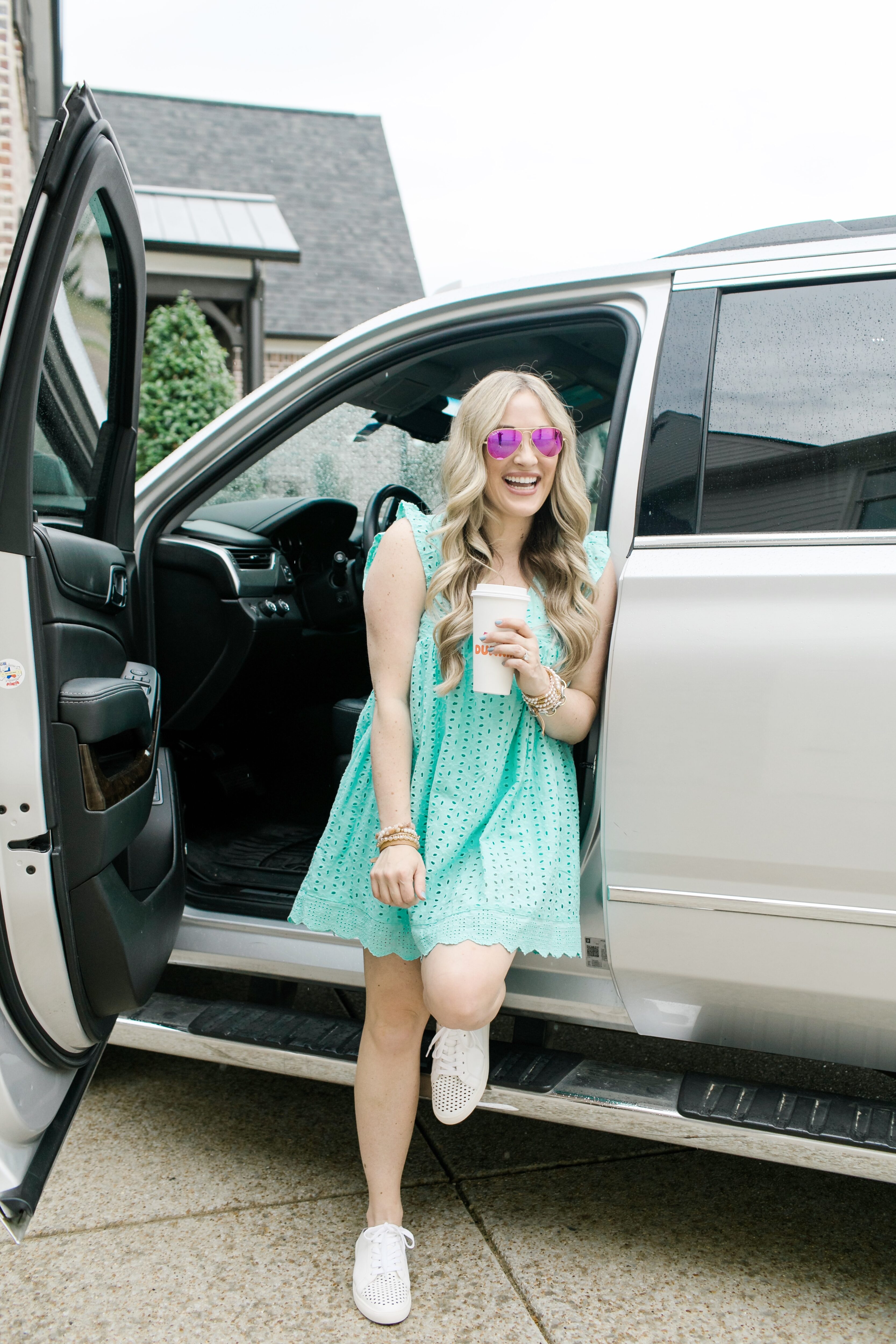 Eyelet fashion trend for 2021 featured by top Memphis fashion blogger, Walking in Memphis in High Heels: image of a woman wearing a Red Dress blue eyelet dress.