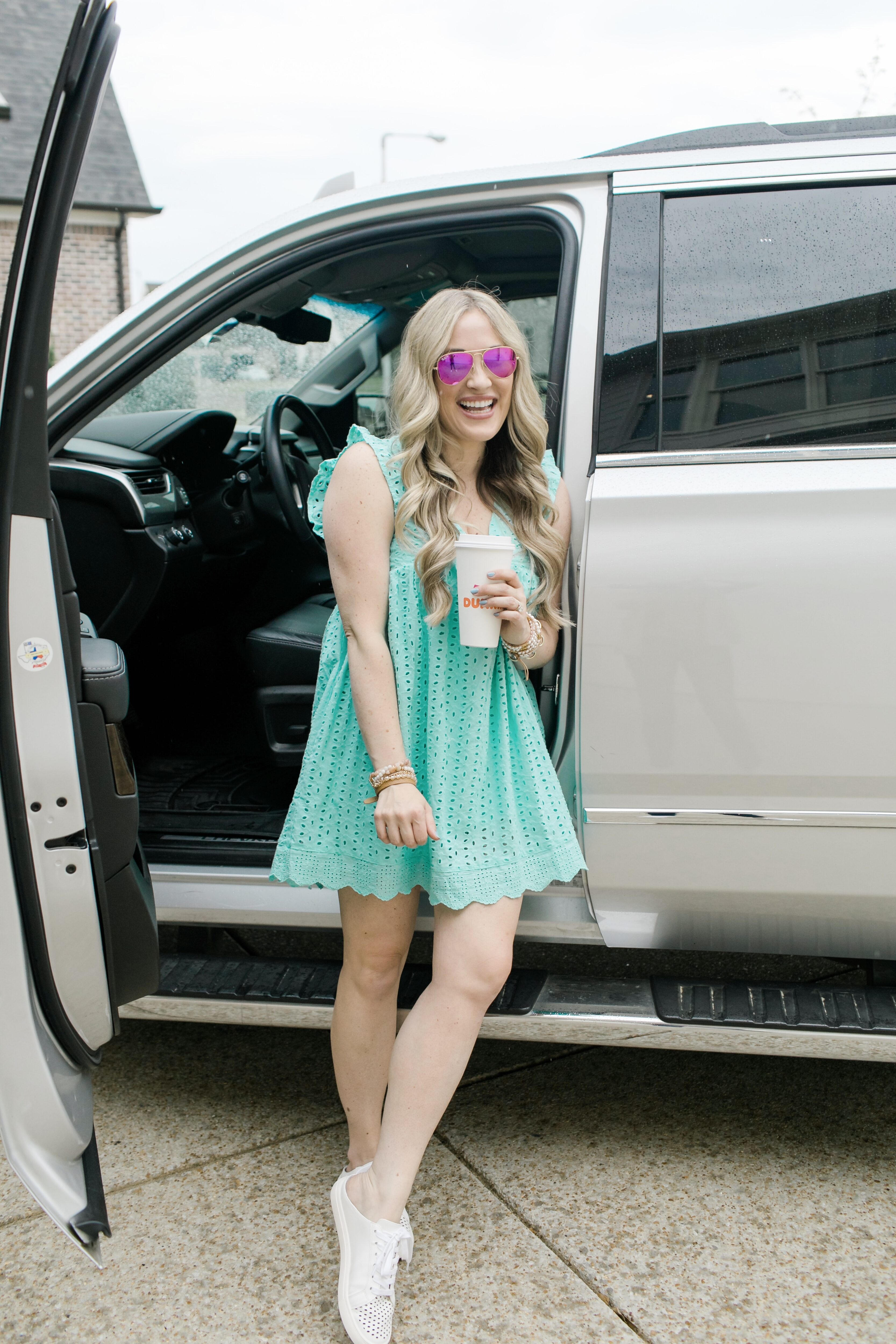 Eyelet fashion trend for 2021 featured by top Memphis fashion blogger, Walking in Memphis in High Heels: image of a woman wearing a Red Dress blue eyelet dress.