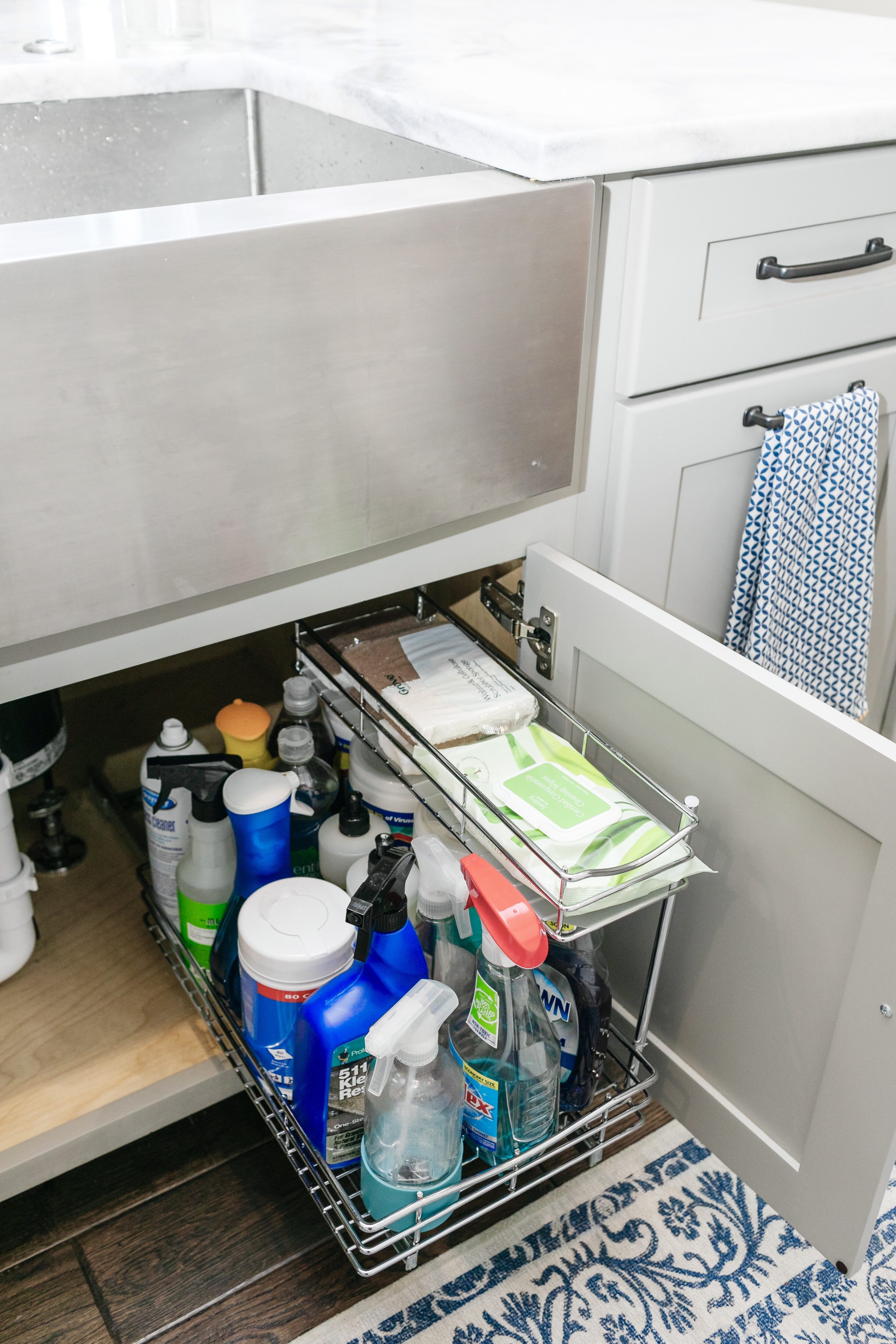 How to Organize Under Your Kitchen Sink, tips featured by top Memphis lifestyle blogger, Walking in Memphis in High Heels.