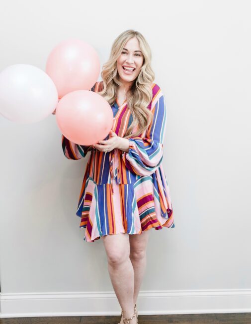 Cute Summer Cookout Outfits featured by top Memphis fashion blogger, Walking in Memphis in High Heels: image of a woman wearing a Red Dress Boutique rainbow dress.