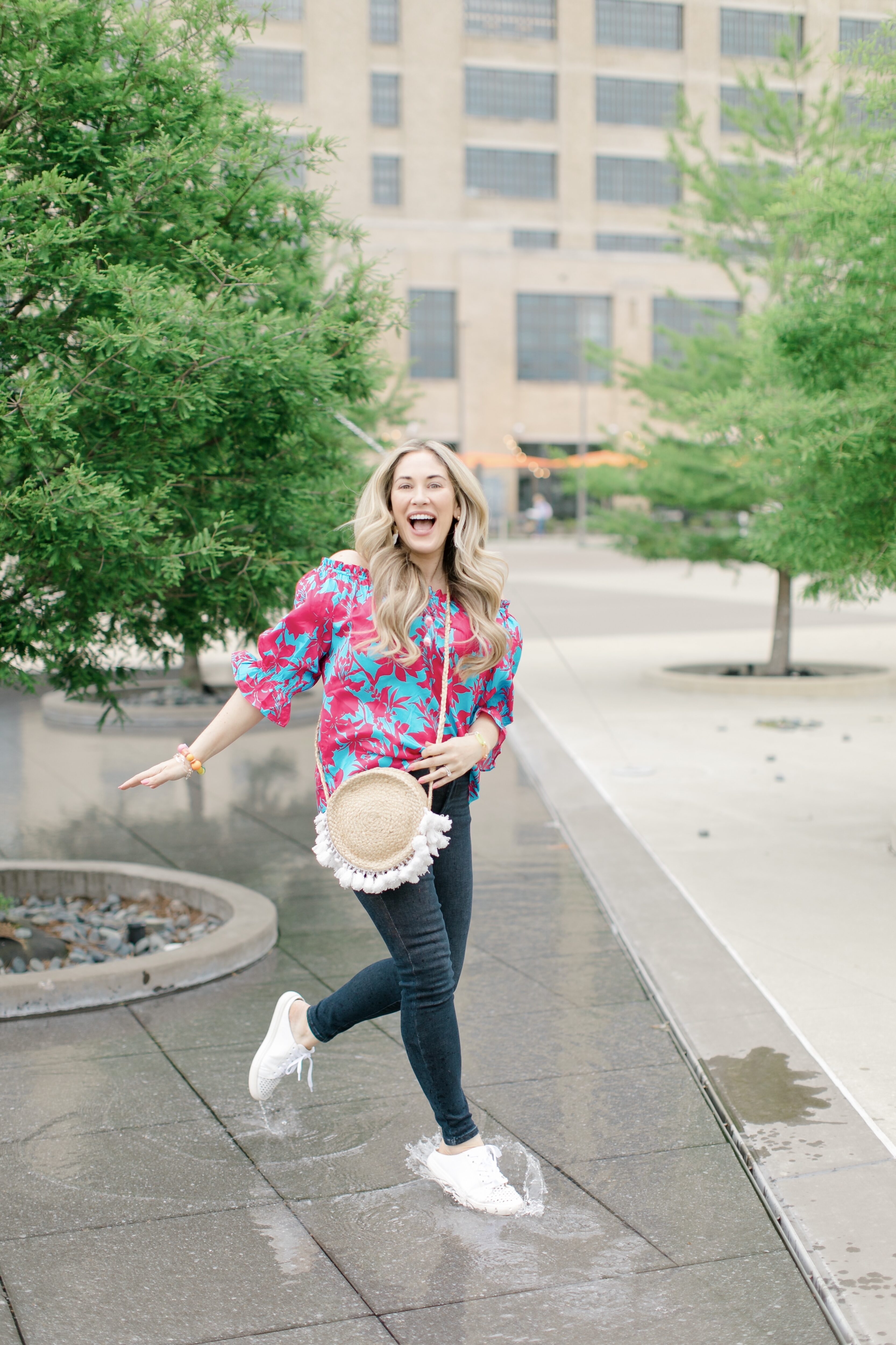 Bright summer colors featured by top Memphis fashion blogger, Walking in Memphis in High Heels: image of a woman wearing a Hale Bob silk top.