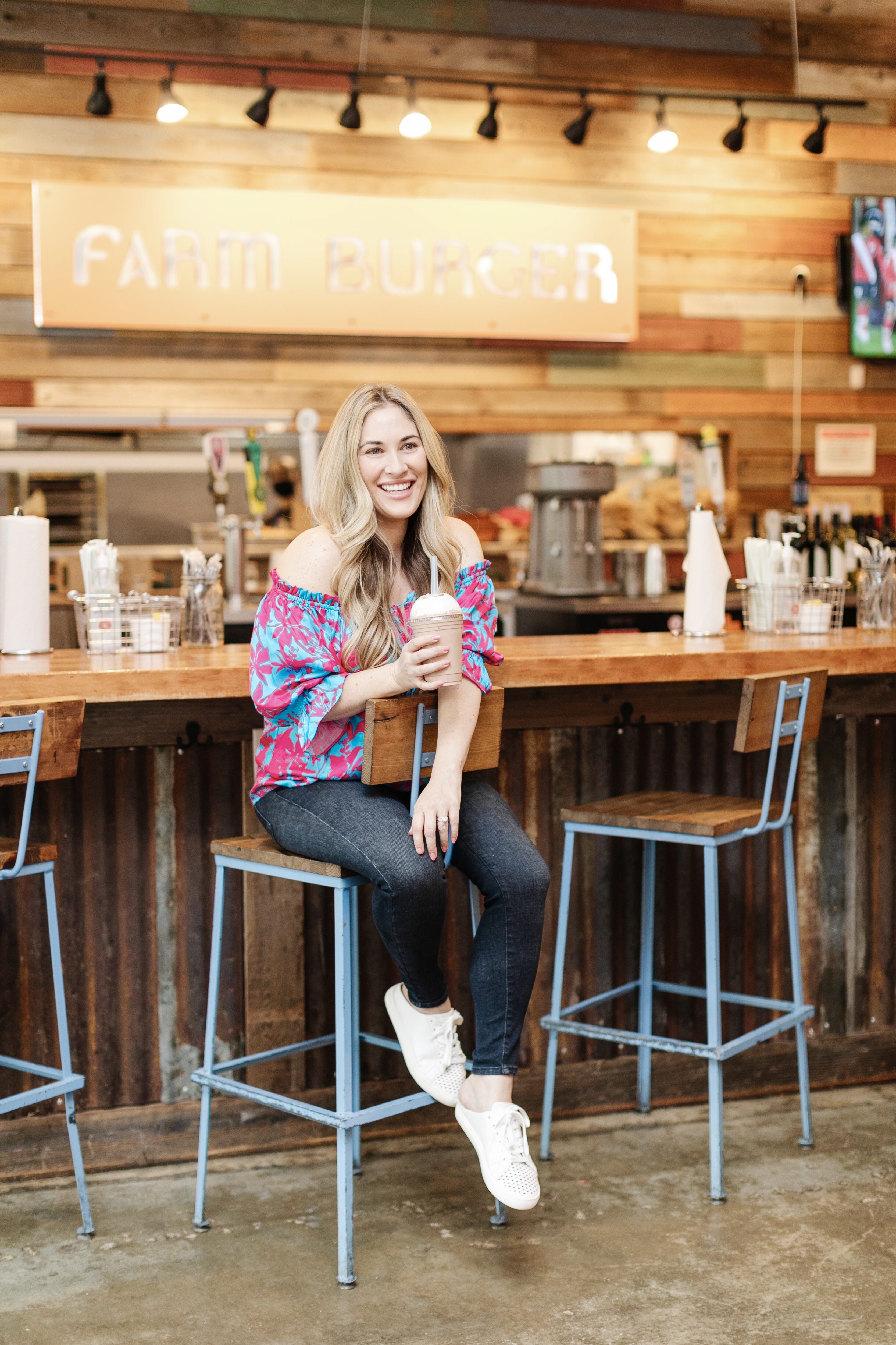 Bright summer colors featured by top Memphis fashion blogger, Walking in Memphis in High Heels: image of a woman wearing a Hale Bob silk top.