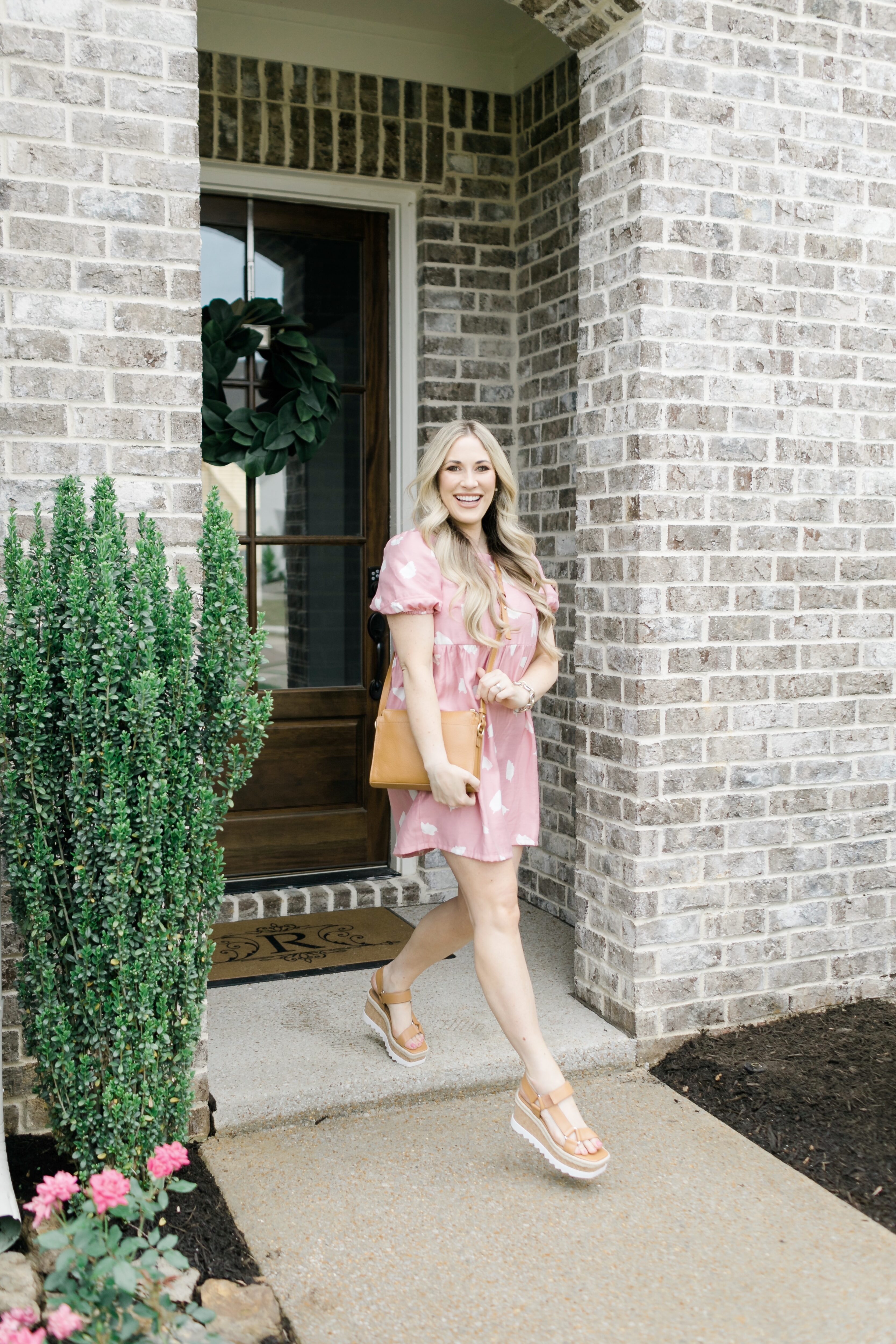 Pink summer essentials featured by top Memphis fashion blogger, Walking in Memphis in High Heels: image of a woman wearing a Pink LOFT swing dress.