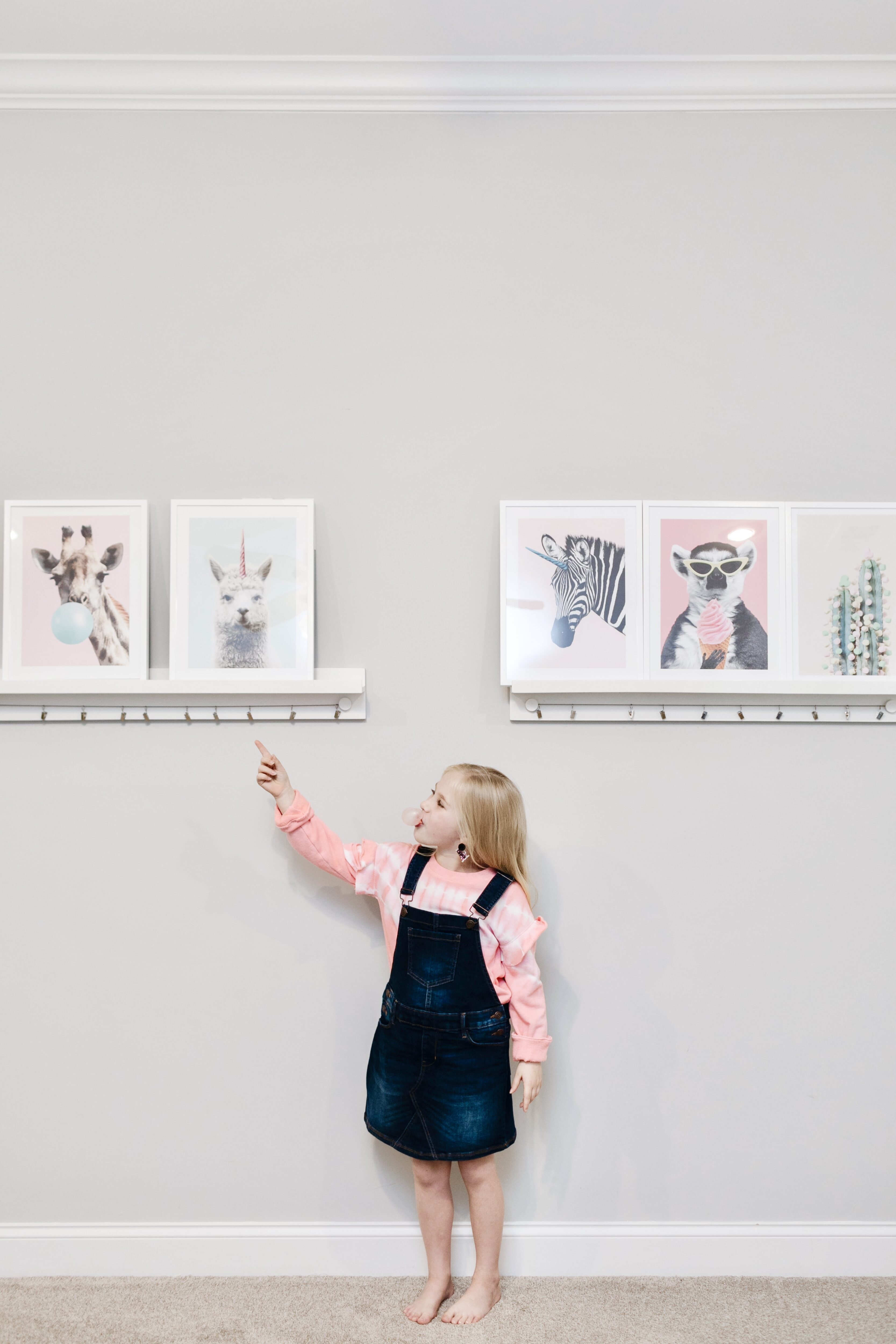 Desenio Gallery Wall in a child's bedroom by top US mom blogger, Walking in Memphis in High Heels.