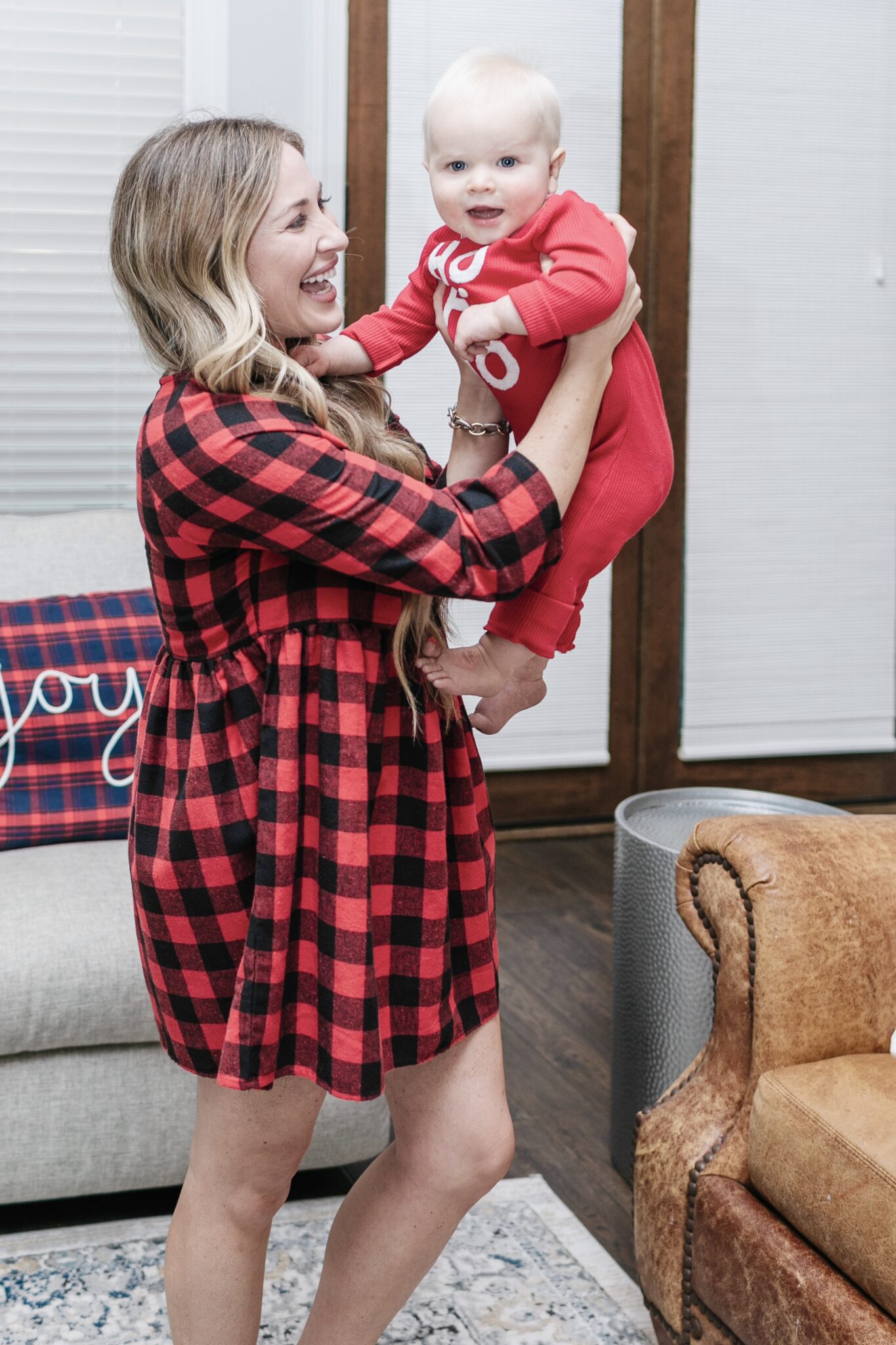 Cute Christmas Looks featured by top mom fashion blogger, Walking in Memphis in High heels: image of a woman wearing an old Navy plaid mini dress.